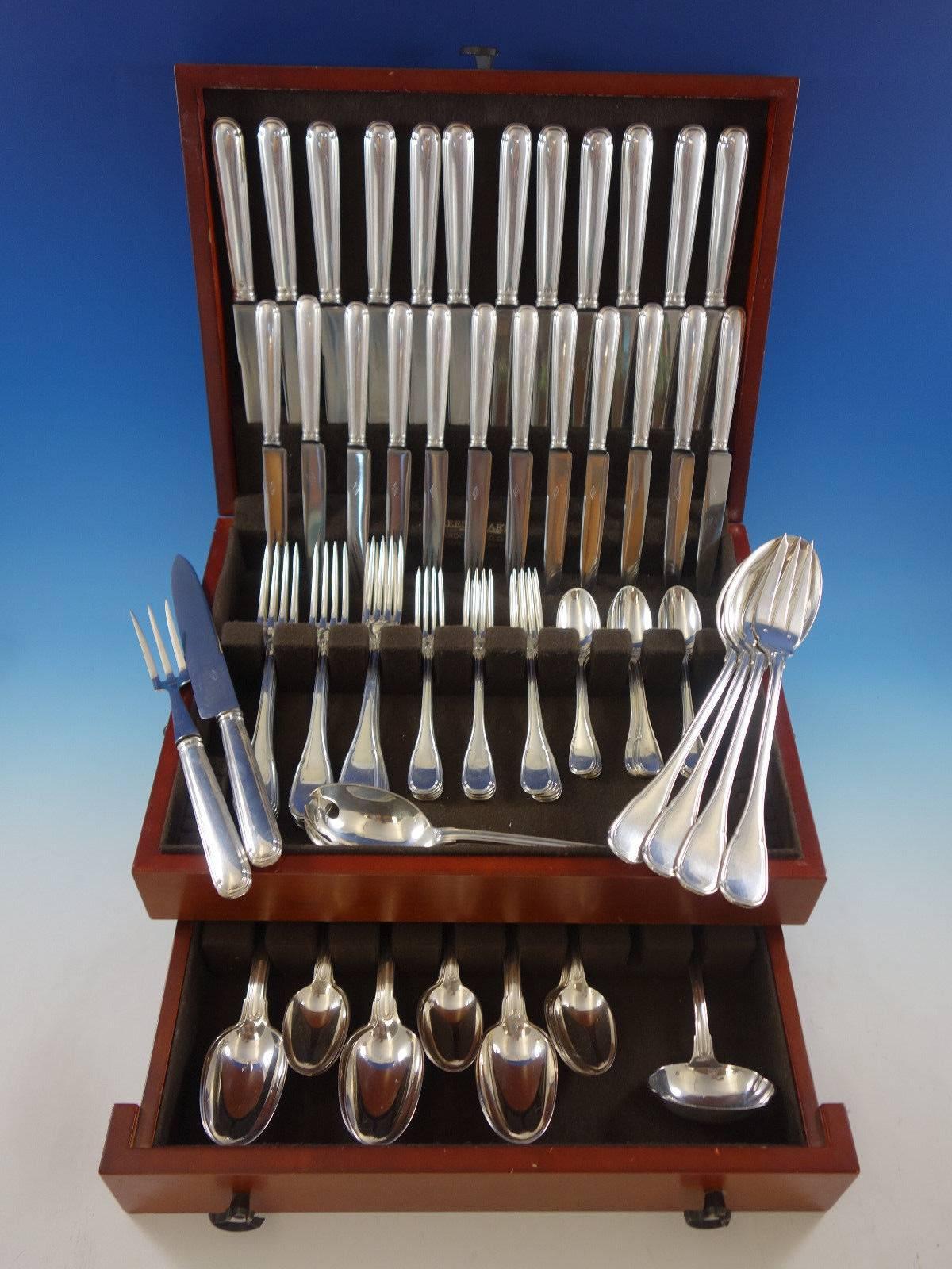 Large Puiforcat (looks like Noailles) French sterling silver flatware set of 93 pieces. This set includes: 12 dinner size knives, 10