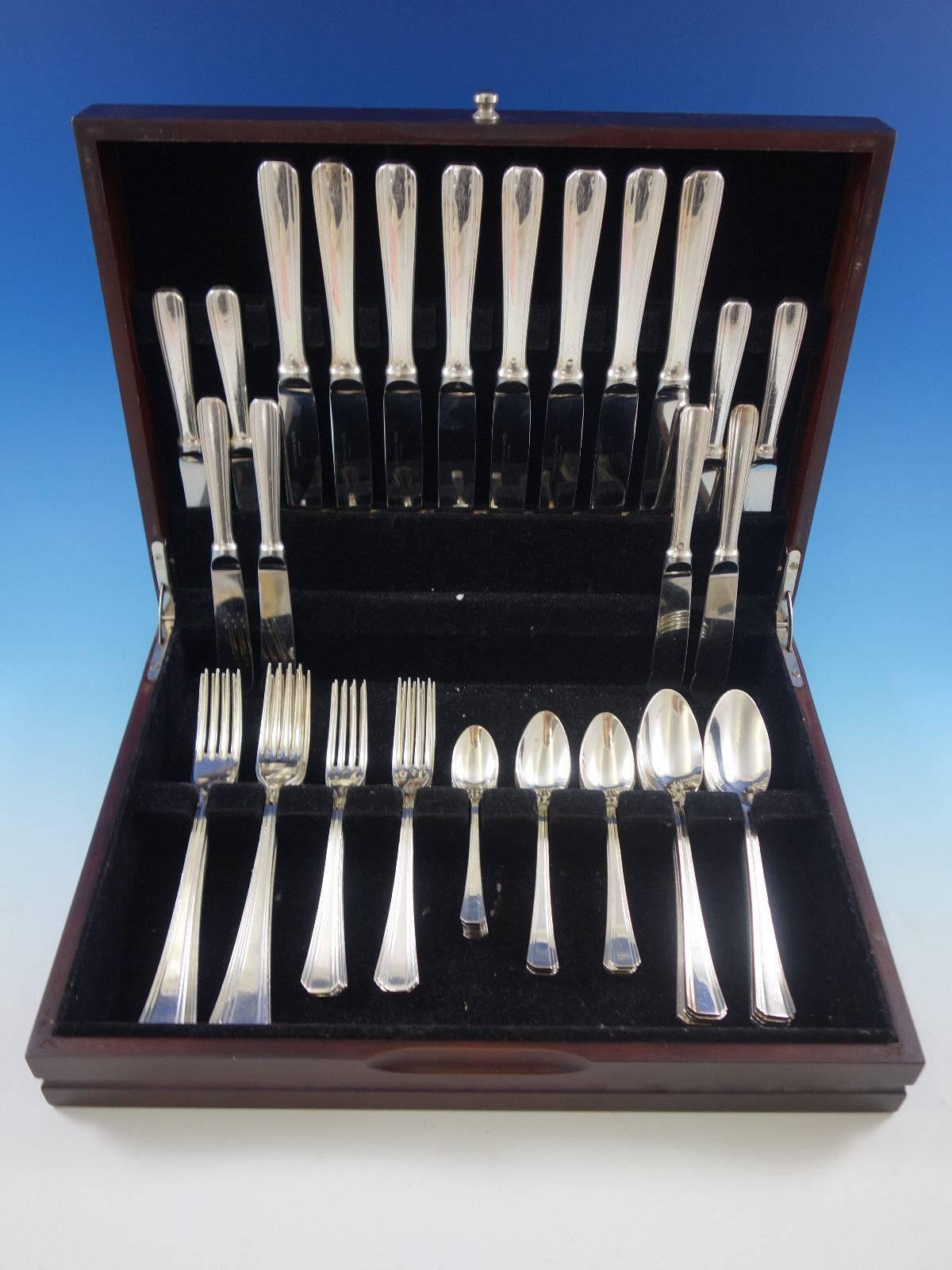 Palme Hotelware Christofle France silver plated flatware set of 56 pieces. This set includes: Eight dinner size knives, 9 3/4