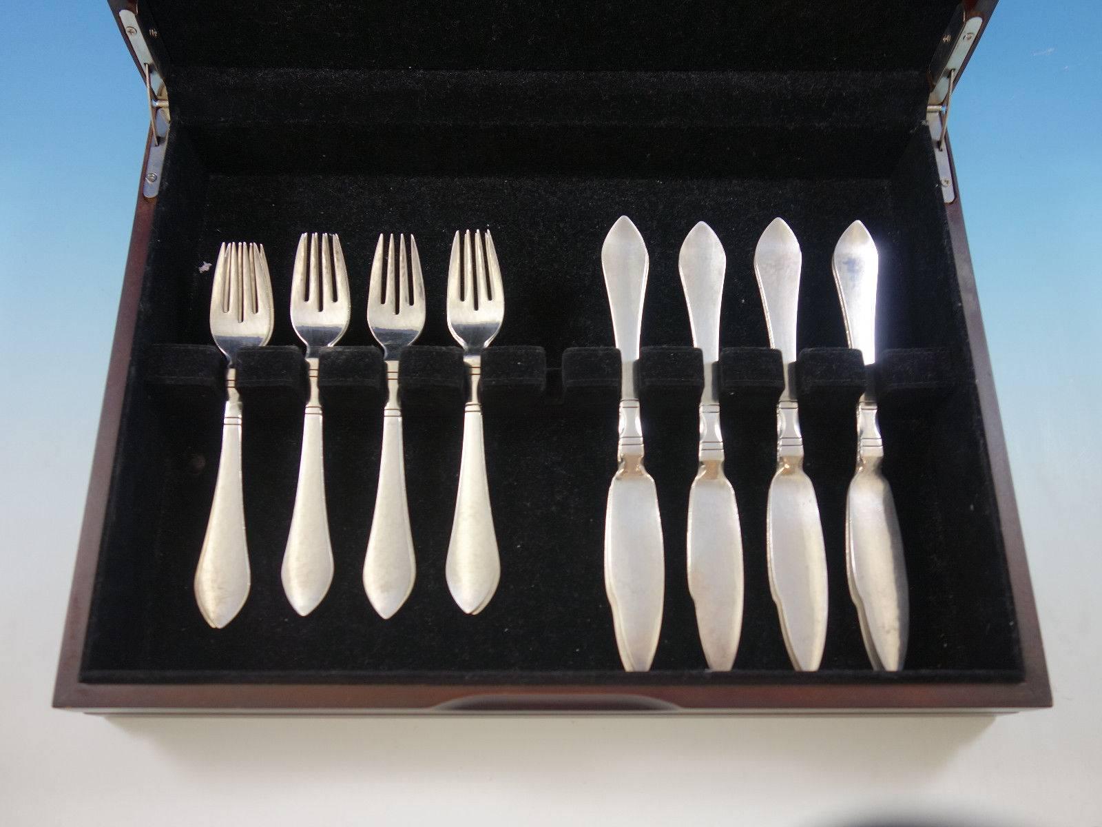 Continental by Georg Jensen sterling silver Individual Fish set, 16 pieces. This set includes: 

8 individual fish knives, flat handle all-sterling, 8 1/4