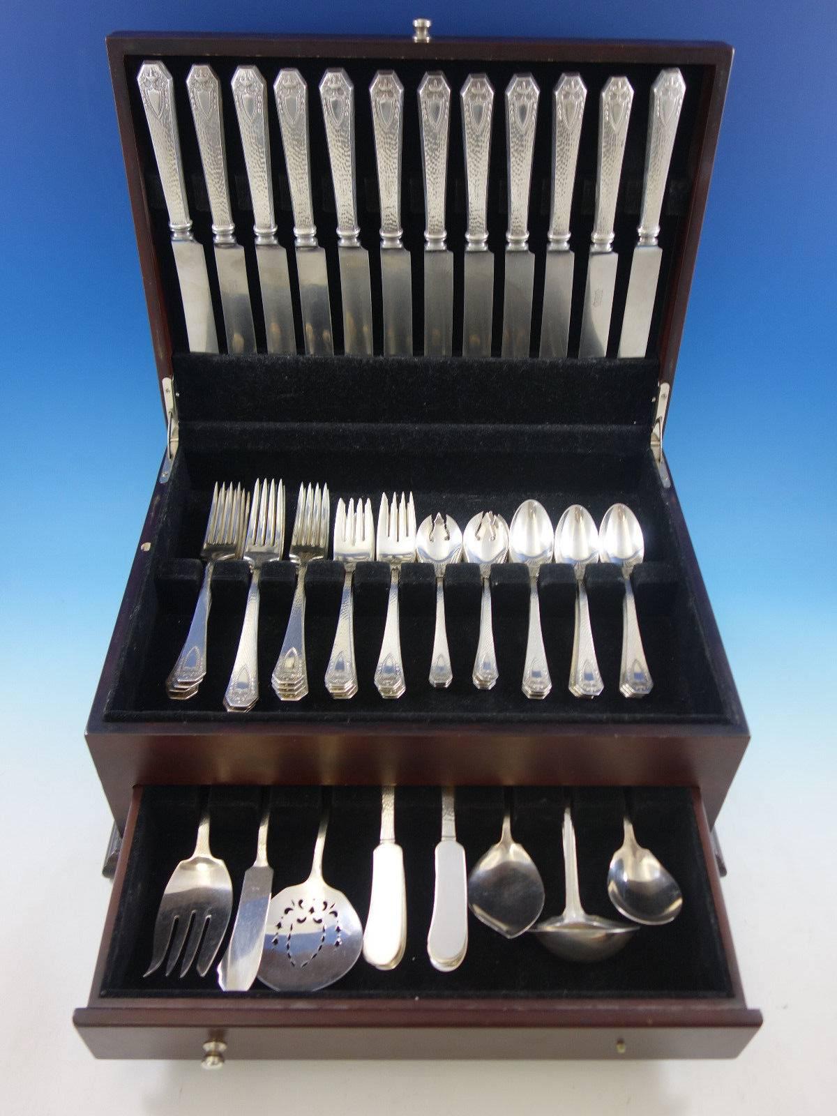 Heraldic by 1847 Rogers Bros, silver plated flatware set, 79 pieces. This set includes: 

12 dinner knives, 9 1/2