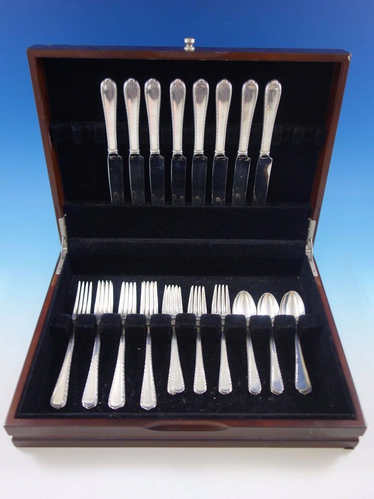 Pine Tree by International sterling silver flatware set, 32 pieces. This set includes: 

Eight knives, 9 1/8