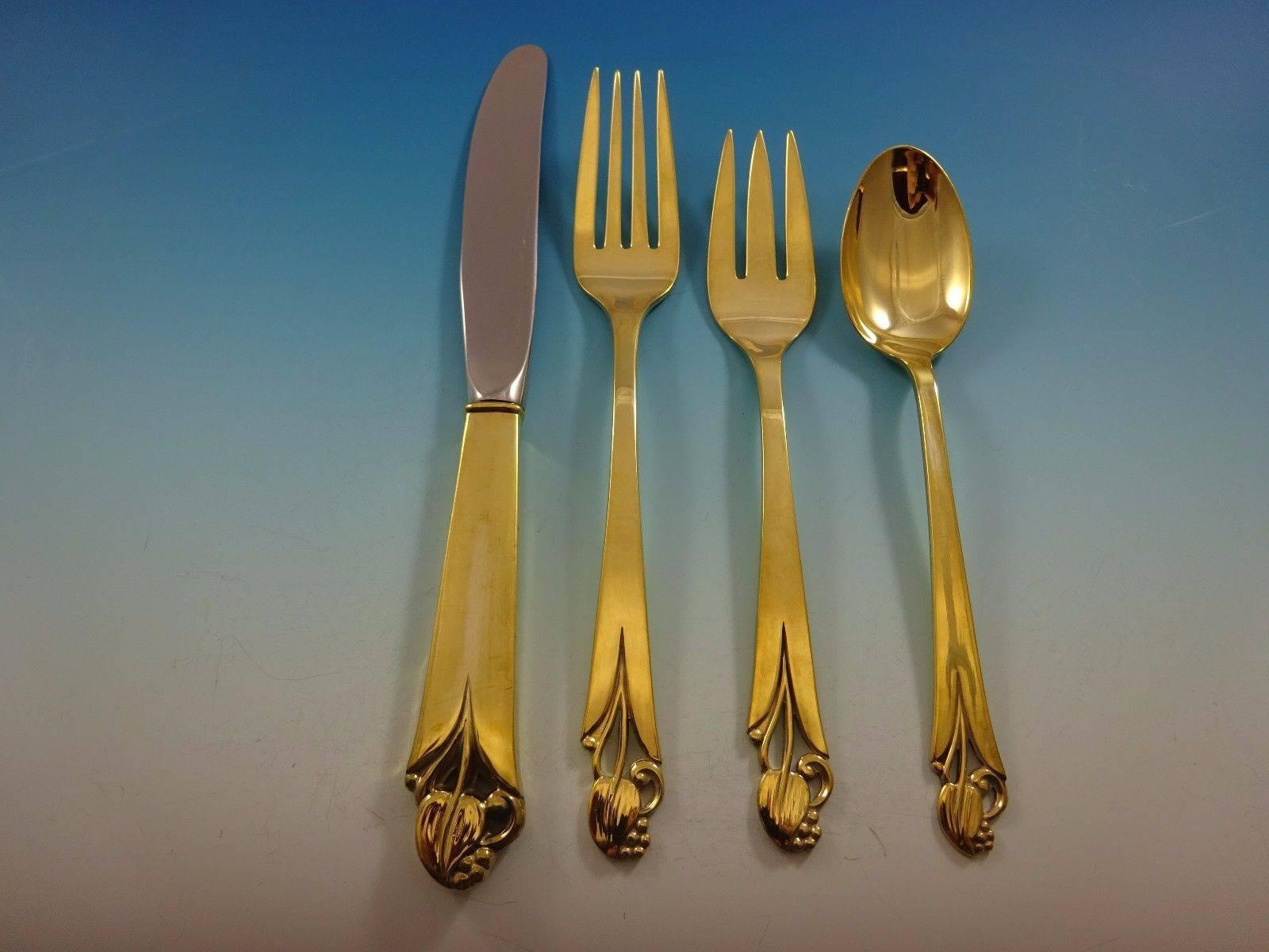 Woodlily Gold by Frank Smith Sterling silver flatware set of 24 pieces. This set is vermeil (completely gold-washed) and includes: 

Six knives, 8 3/4