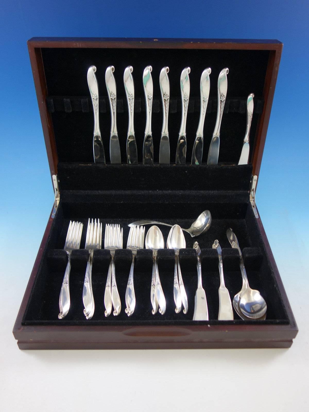 Wishing Star by Wallace sterling silver flatware set, 44 pieces. This set includes: 

Eight knives, 9