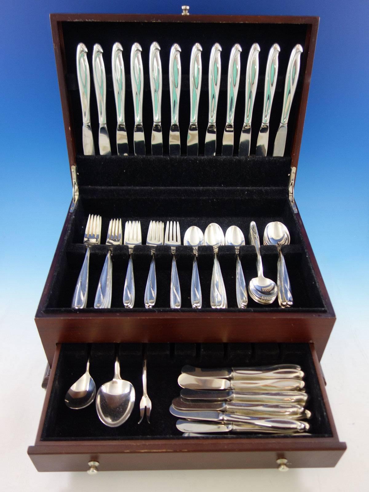 Silver sculpture by Reed and Barton sterling silver flatware set, 77 pieces. This set includes: 

12 knives, 9
