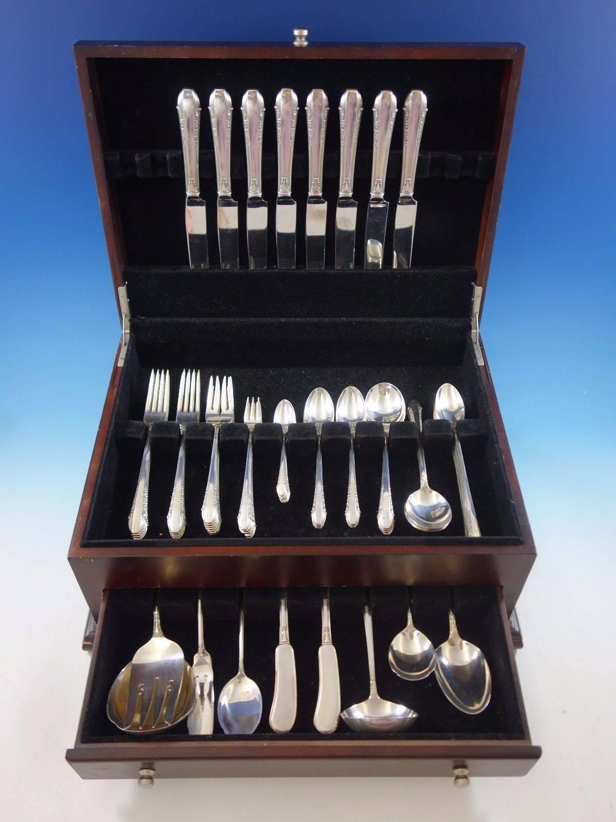 Enchantress by International sterling silver flatware set, 80 pieces. This set includes: 

eight knives, 8 3/4
