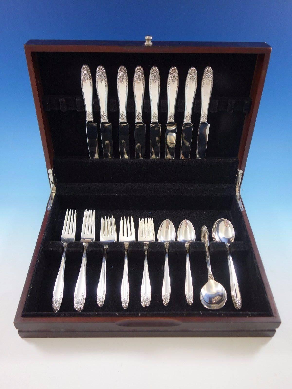 Prelude by International sterling silver flatware set, 40 pieces. This set includes: 

Eight knives, 9 1/4