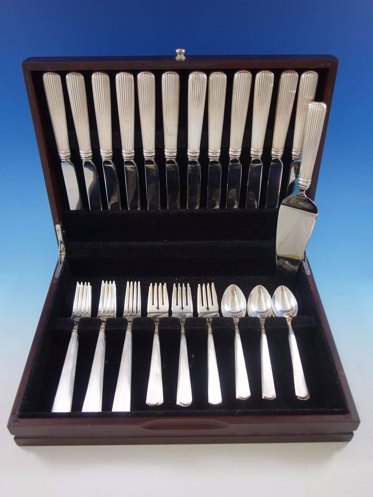 Ashmont by Reed and Barton sterling silver flatware set, 49 pieces. This set includes: 

12 dinner size knives, 9 7/8