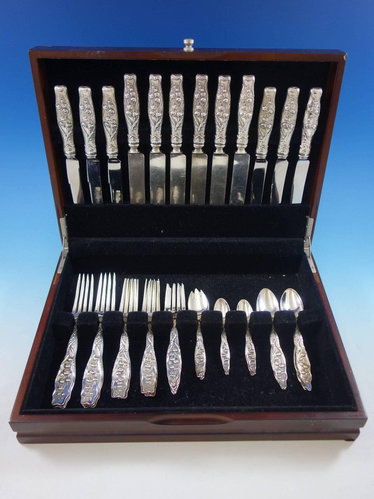 Lily of the valley by Whiting sterling silver flatware set, 48 pieces. This set includes: 

six dinner size knives, 9 1/2