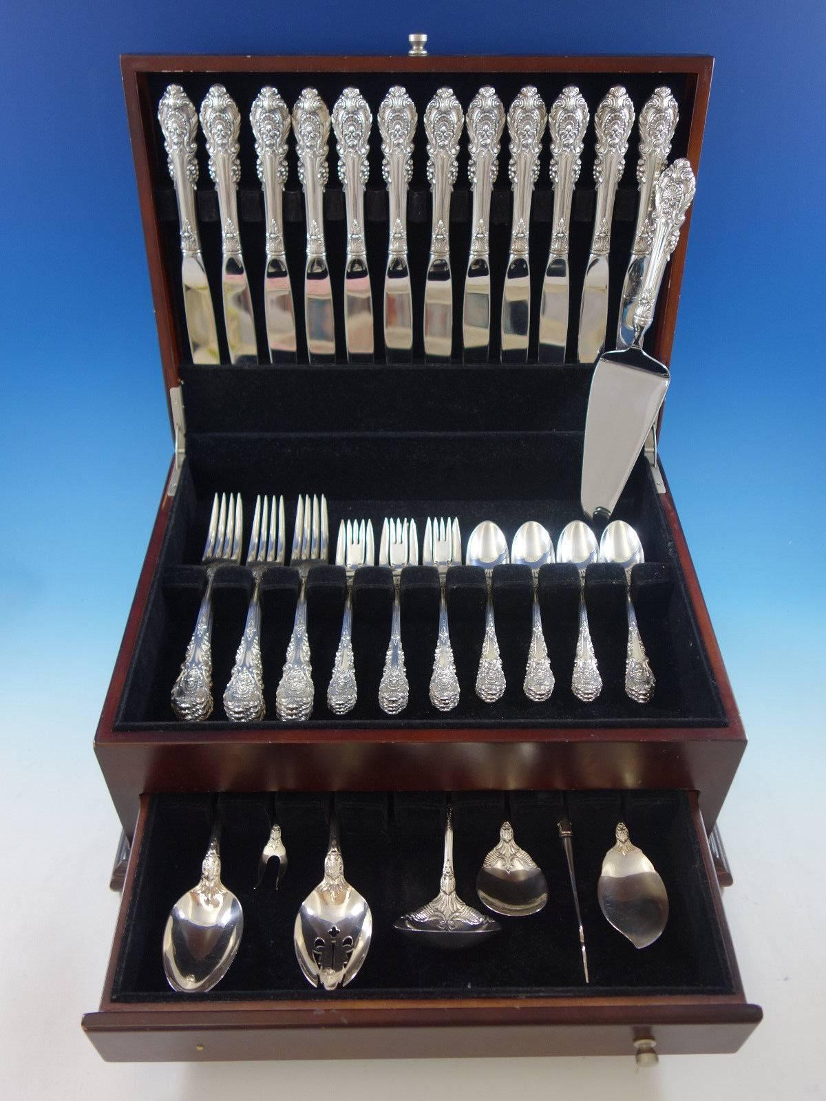 Dinner Size Sir Christopher by Wallace sterling silver flatware set of 56 pieces. This set includes: 

12 dinner size knives, 9 3/4