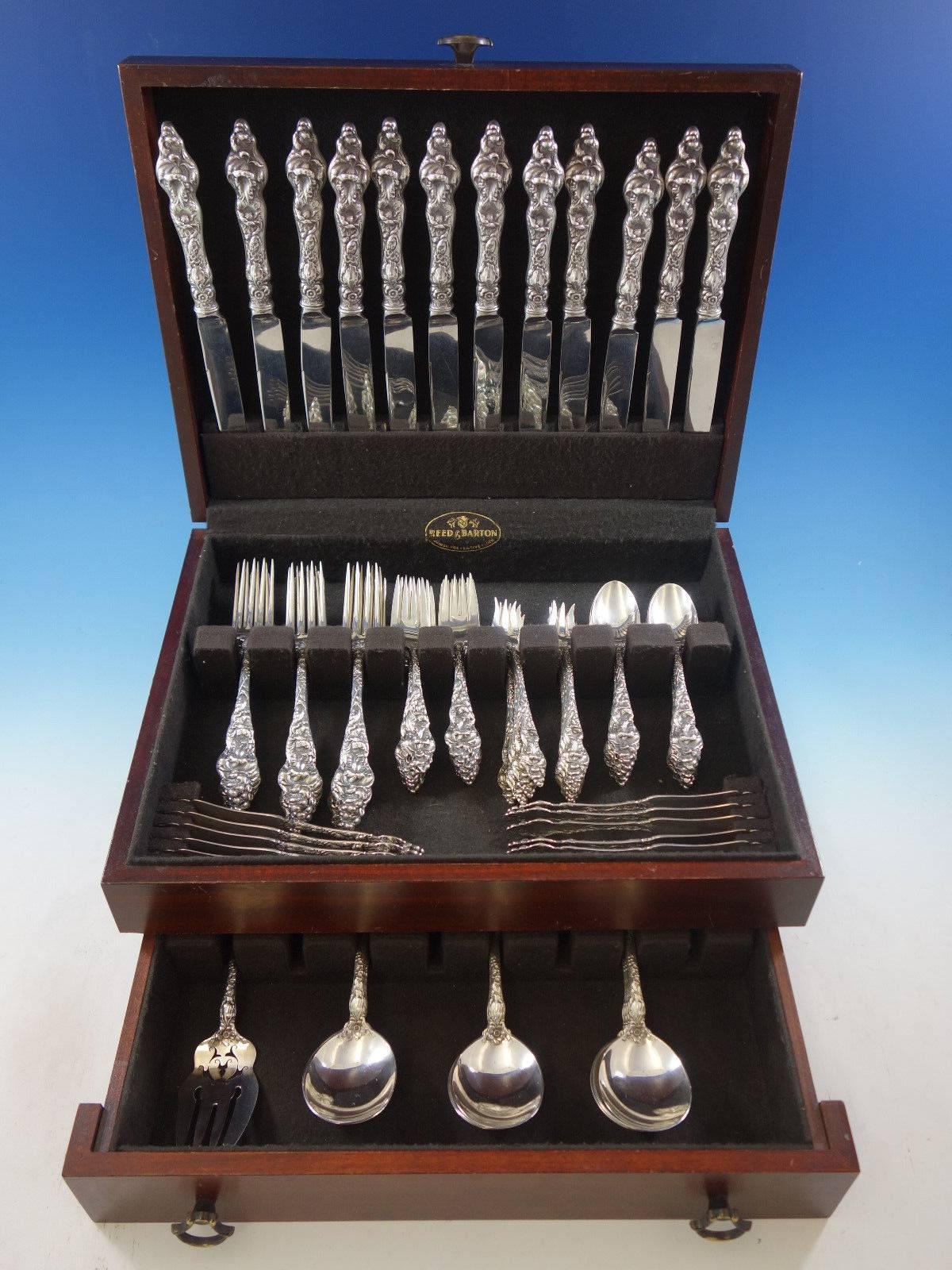 Les Six Fleurs Reed & Barton sterling silver dinner size flatware set of 85 pieces. This set includes:

12 dinner size knives, 9 3/4