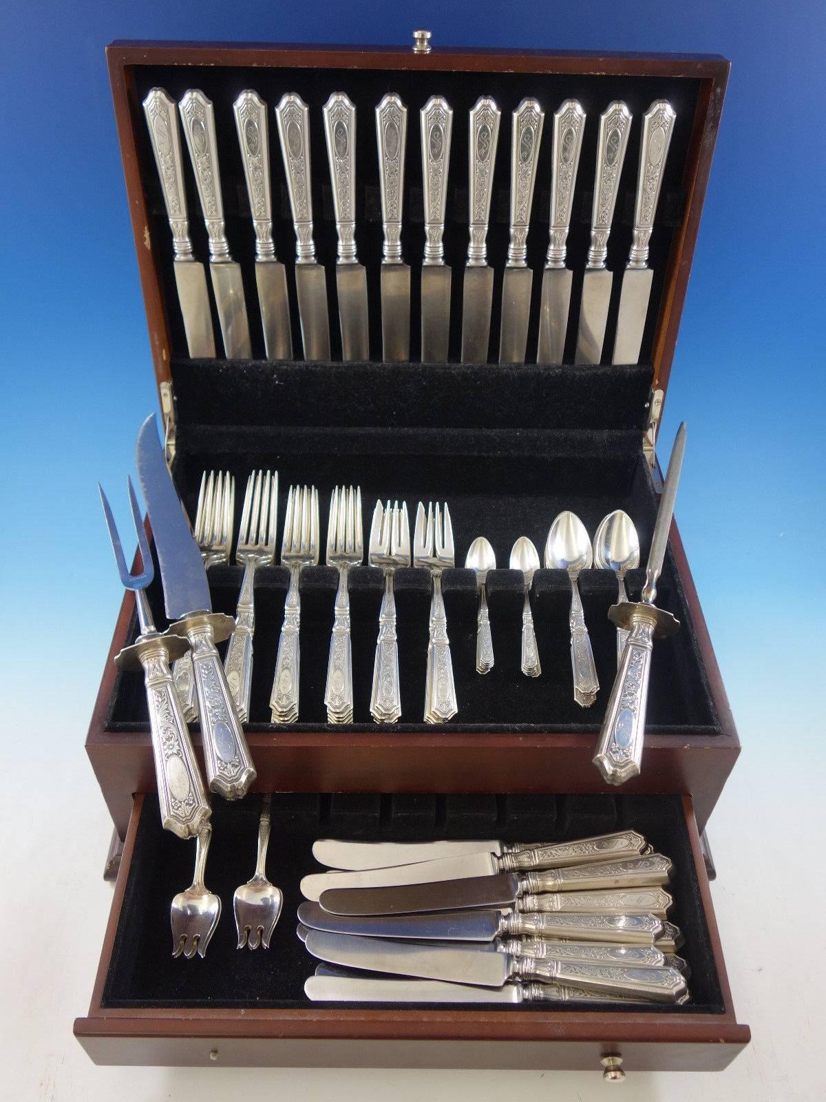 Saint Dunstan Chased by Gorham sterling silver dinner and luncheon size flatware set of 93 pieces. This set includes: 

12 dinner size knives, 9 3/4