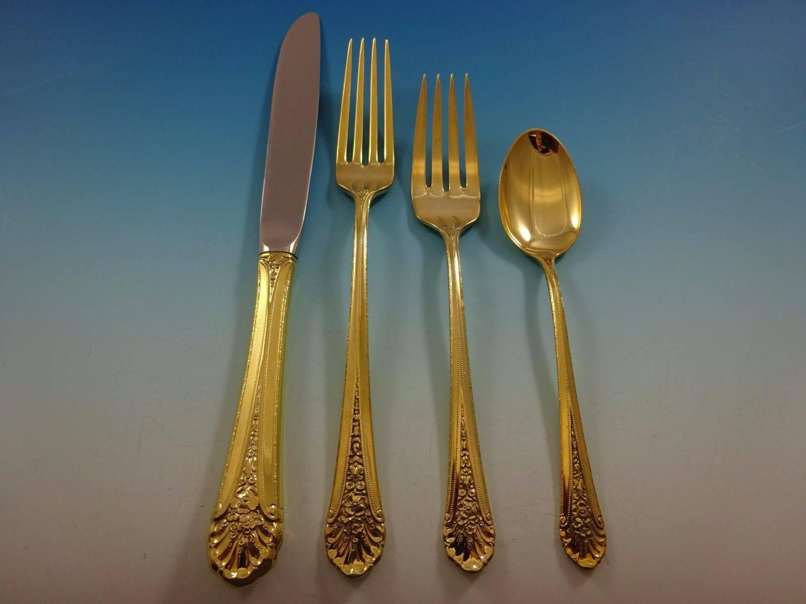 Royal Windsor Gold by Towle sterling silver flatware set - 24 pieces. This set is vermeil (completely gold-washed) and includes: 

Six knives, 8 3/4