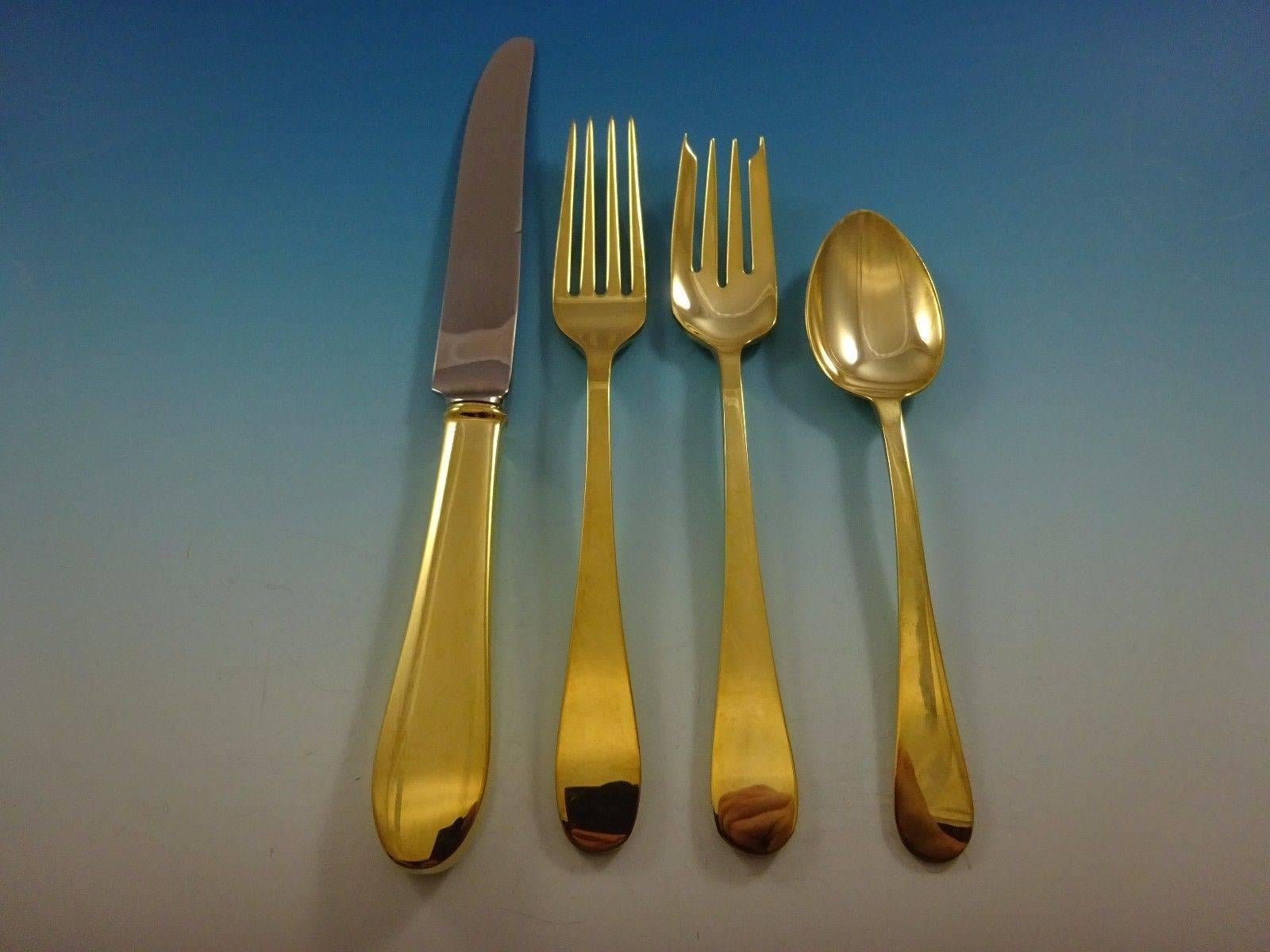 Salem gold by Tiffany and Co. sterling silver flatware set, 24 pieces. This set is vermeil (completely gold-washed) and includes: 

Six knives, 8 1/2