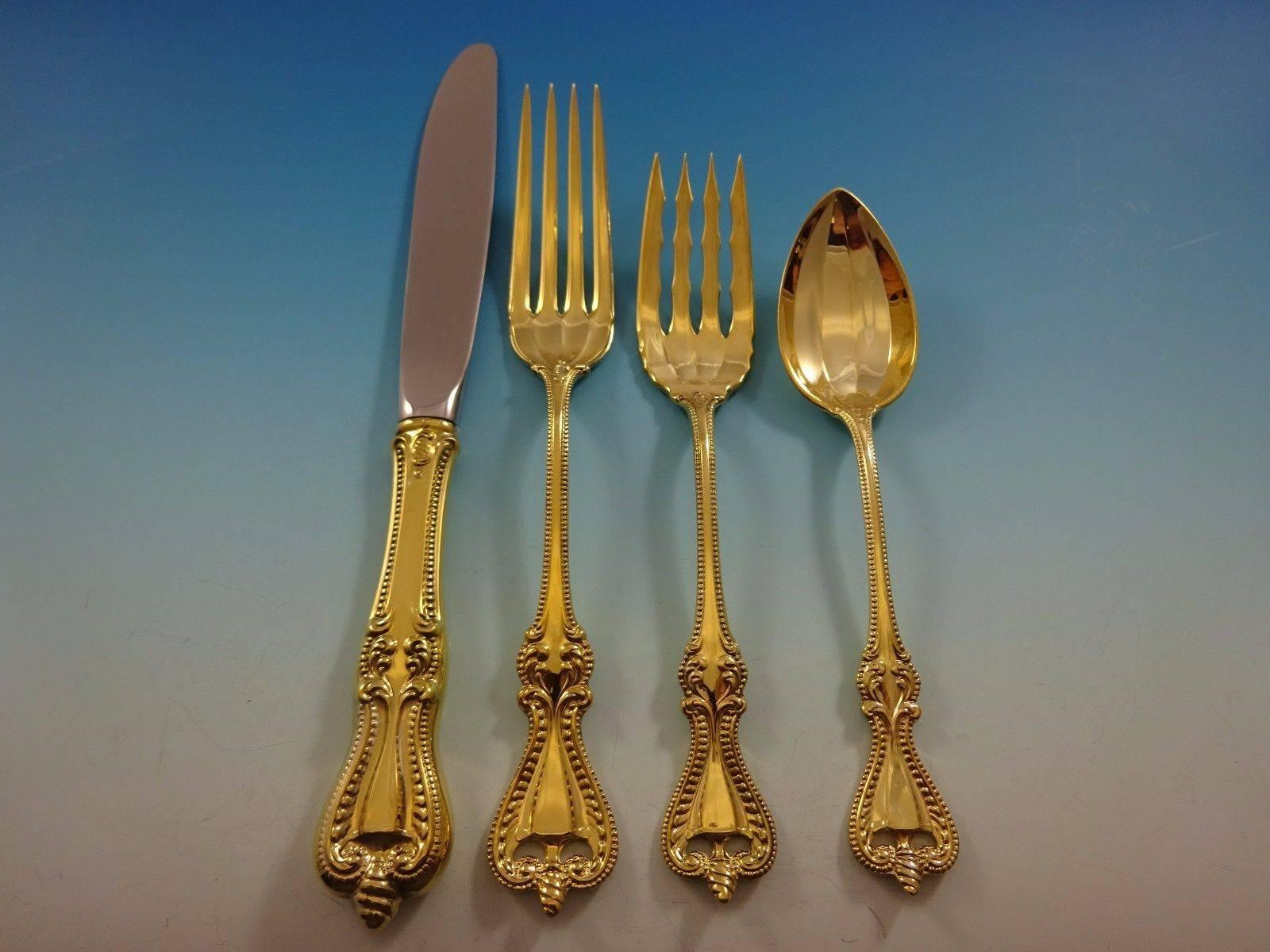 Old Colonial Gold by Towle Sterling Silver flatware set - 32 pieces. This set is vermeil (completely gold-washed) and includes: 

8 Knives, 8 5/8