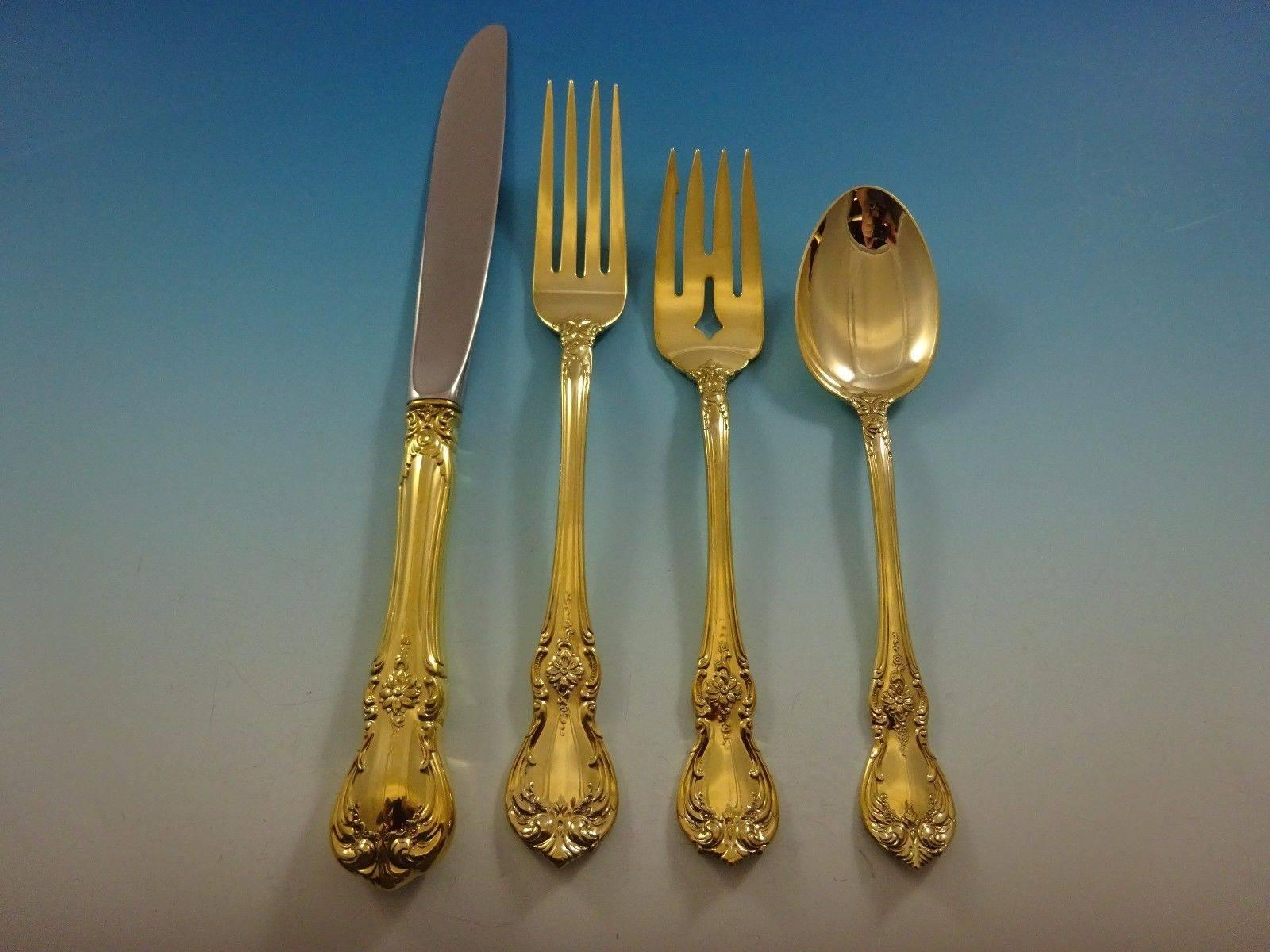 Old Master Gold by Towle Sterling Silver flatware set - 48 pieces. This set is vermeil (completely gold-washed) and includes: 

12 Knives, 8 7/8