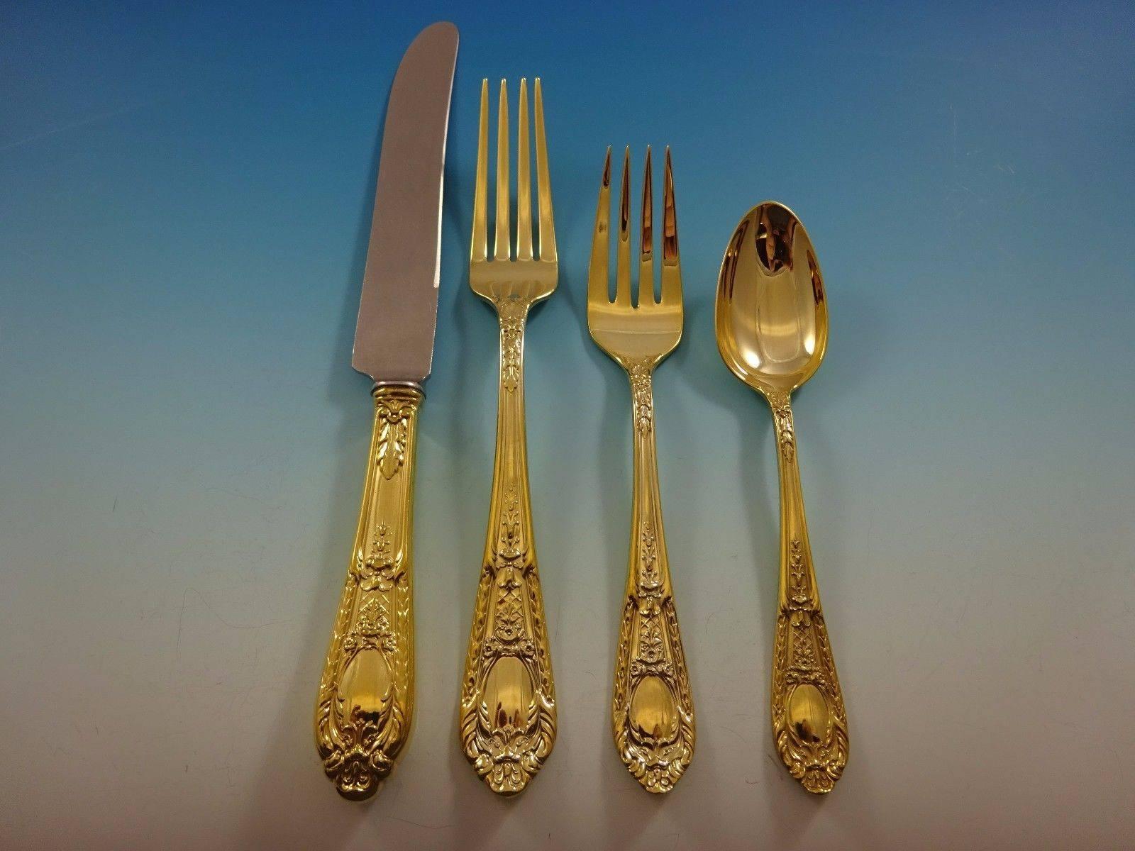 Fontaine Gold by International sterling silver flatware set of 32 pieces. This set is vermeil (completely gold-washed) and includes: 

Eight knives, 8 7/8
