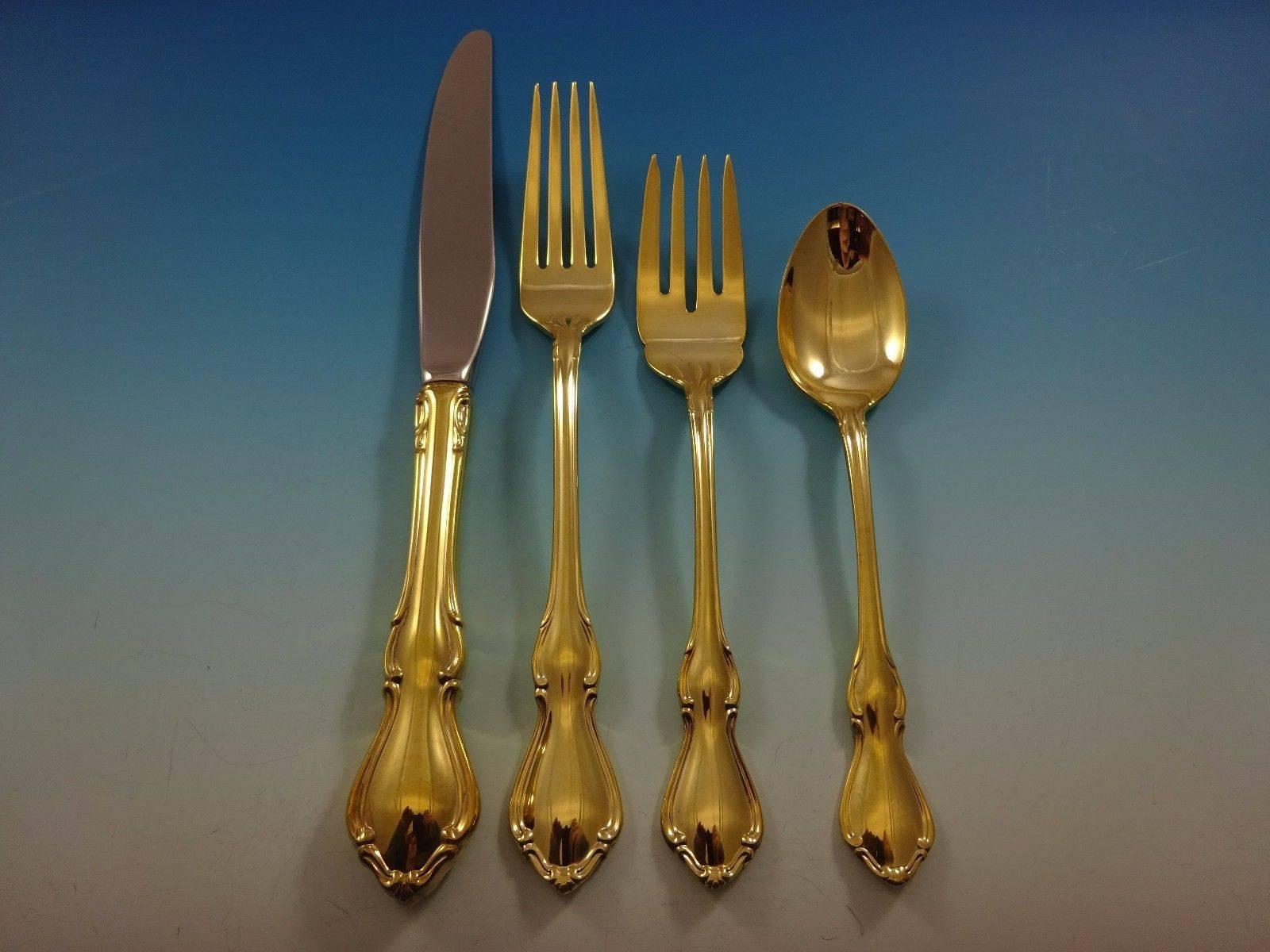 Hampton Court Gold by Reed & Barton sterling silver flatware set - 48 pieces. This set is vermeil (completely gold-washed) and includes: 

12 knives, 9 1/8