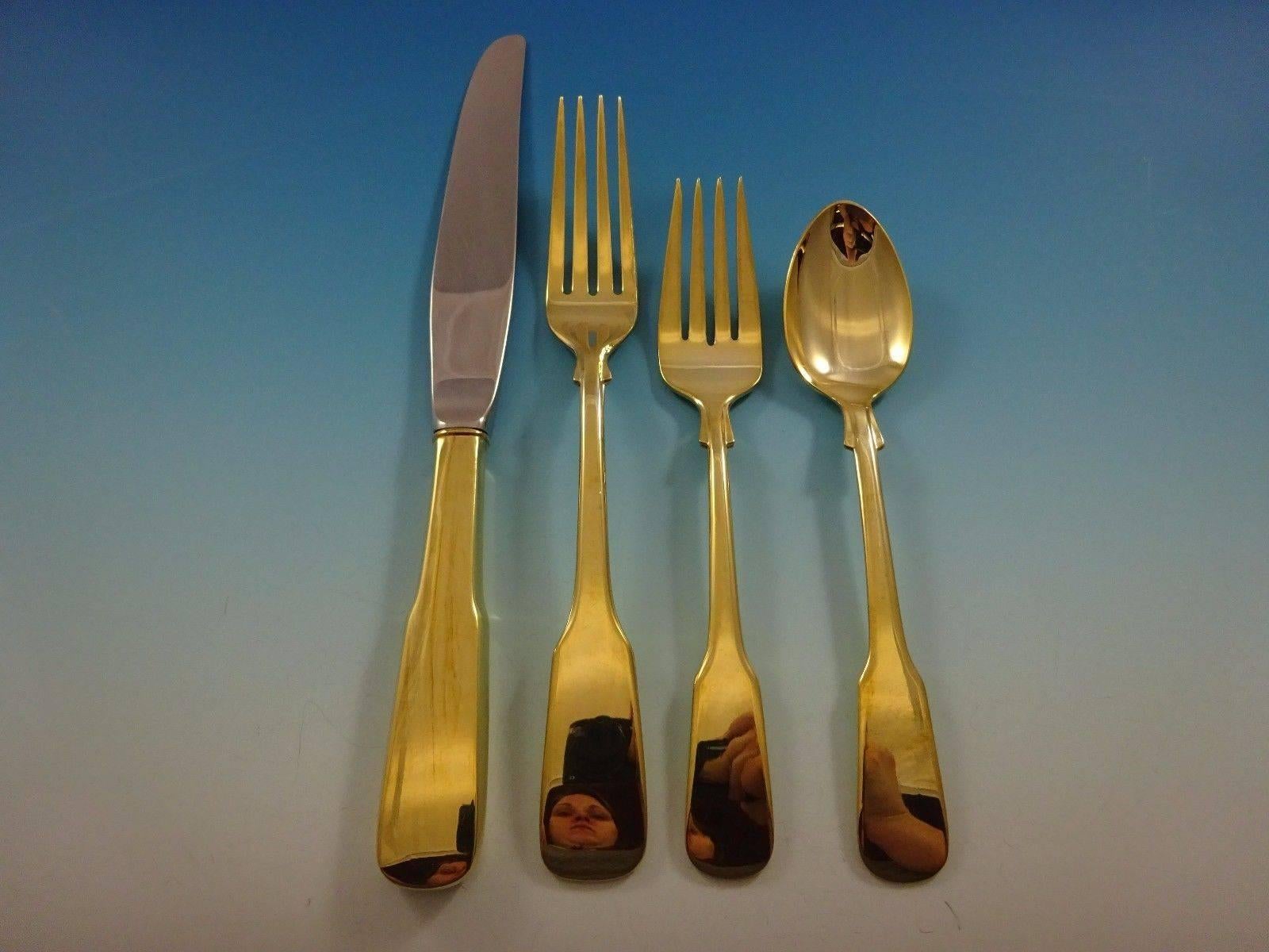 Eighteen ten gold by International sterling silver flatware set - 32 pieces. Gold flatware is on trend and makes a bold statement on your table. This set is vermeil (completely gold-washed) and includes: 

eight knives, 8 7/8