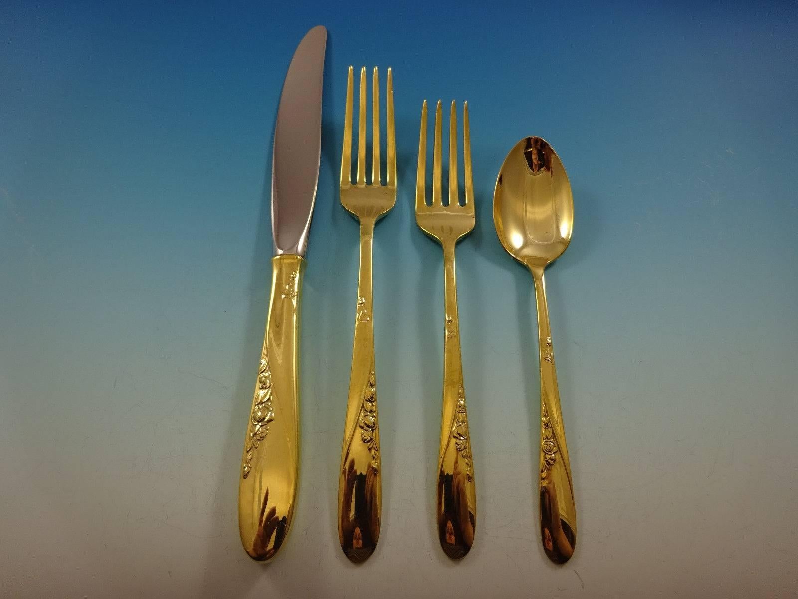 Rose spray gold by Easterling sterling silver flatware set, 48 pieces. Gold flatware is on trend and makes a bold statement on your table. This set is vermeil (completely gold-washed) and includes:

12 knives, 8 7/8