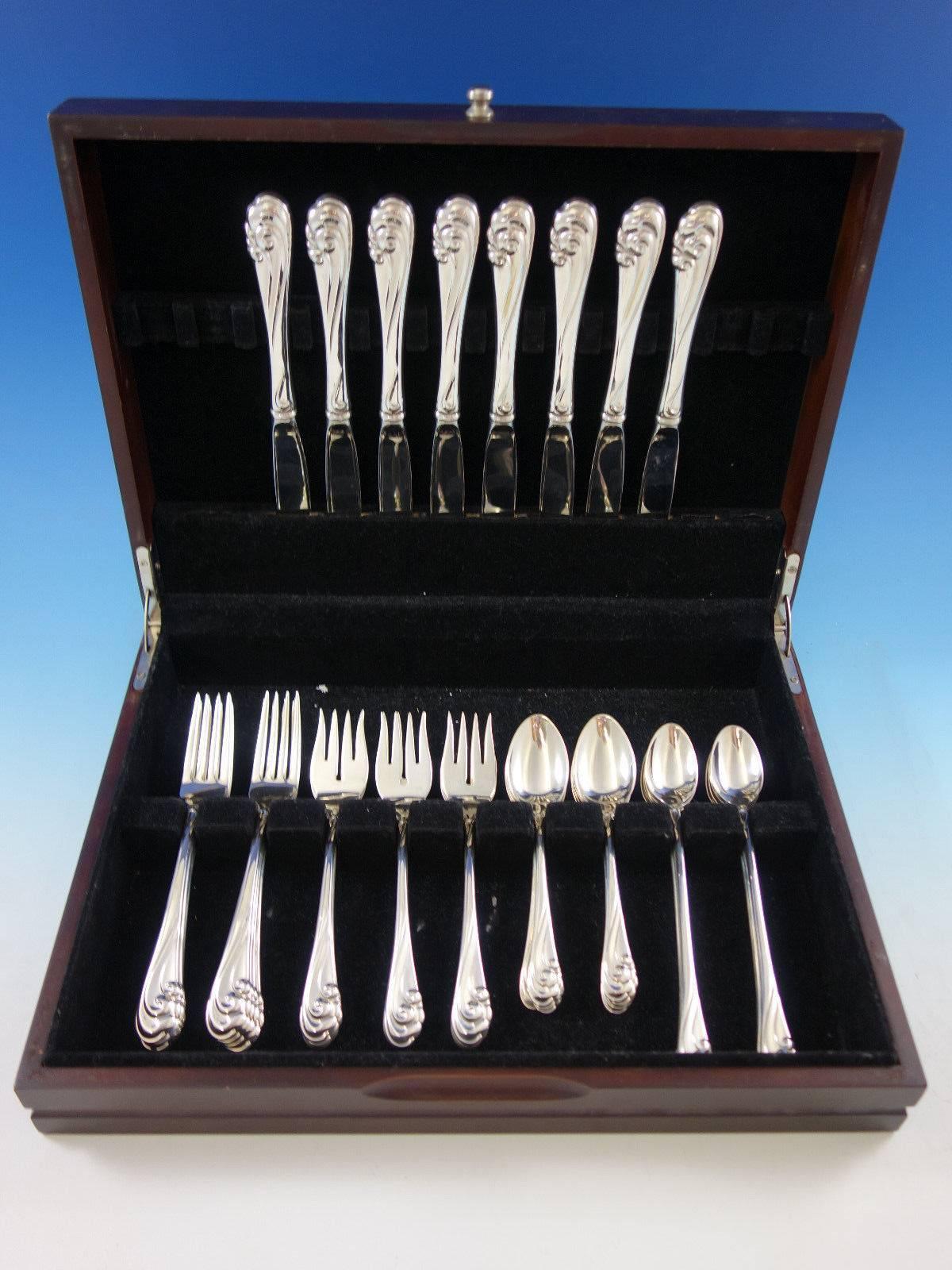 Dancing Surf by Kirk service de couverts en argent sterling, 40 pièces. Cet ensemble comprend :

Huit couteaux, 9