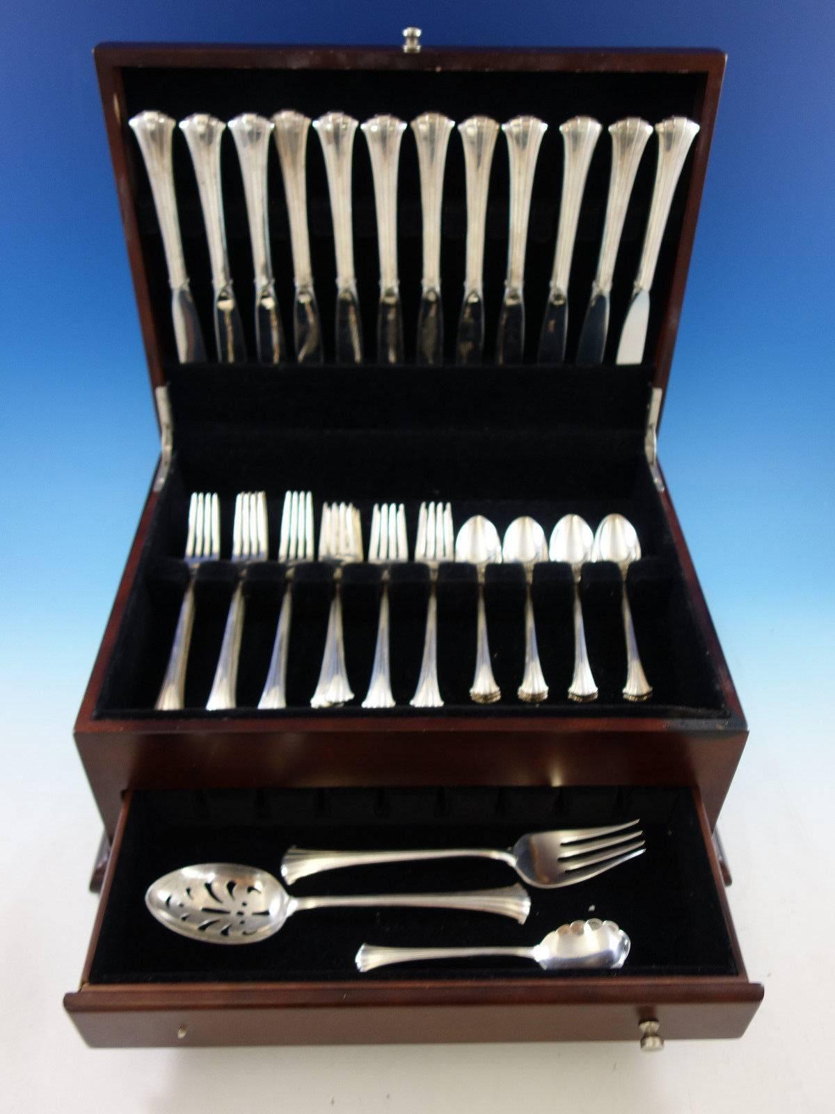 Newport scroll by Gorham sterling silver flatware set, 51 pieces. This set includes: 

12 place size knives, 9 1/8
