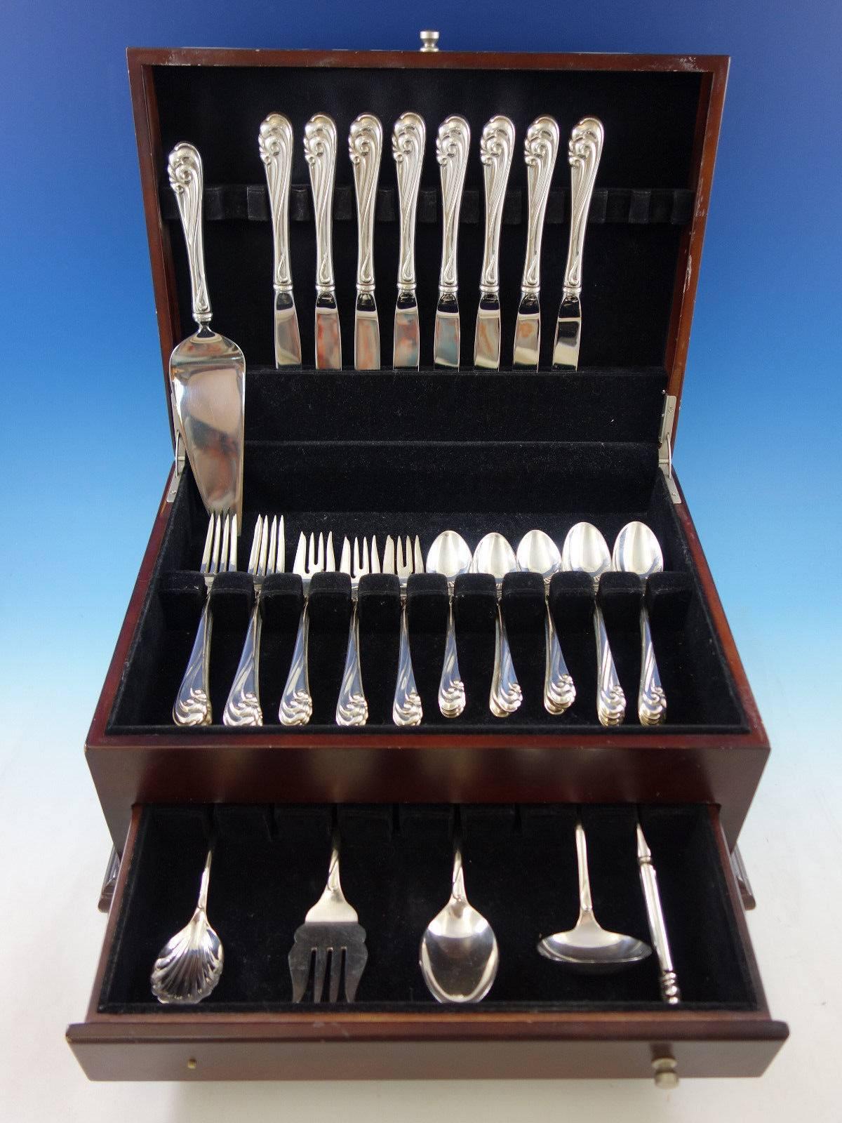 Dancing surf by Kirk sterling silver flatware set, 46 pieces. This set includes: 

eight knives, 9