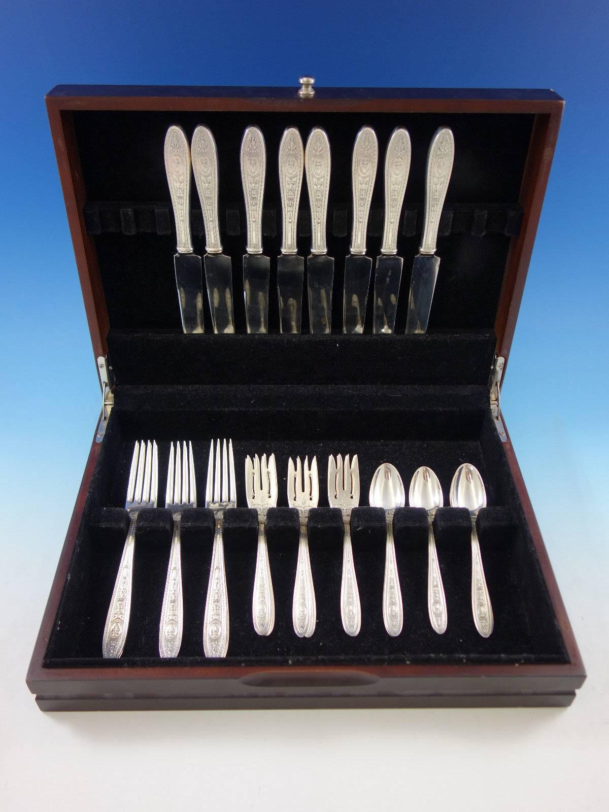 Wedgwood by International sterling silver flatware set, 32 pieces. This set includes: 

eight dinner size knives, 9 5/8