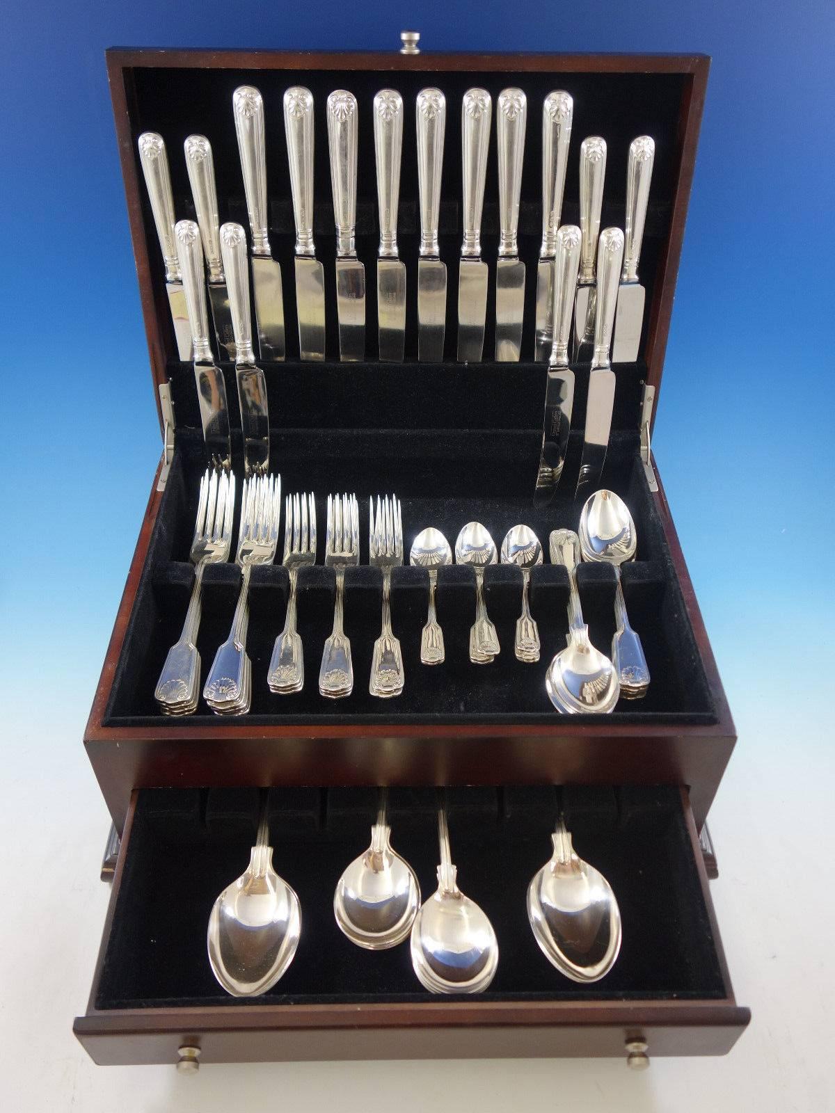 Fiddle Thread & Shell by United Cutlers Ltd. English sterling silver flatware set, 60 pieces. This set includes: 

Eight dinner size knives, 9 7/8