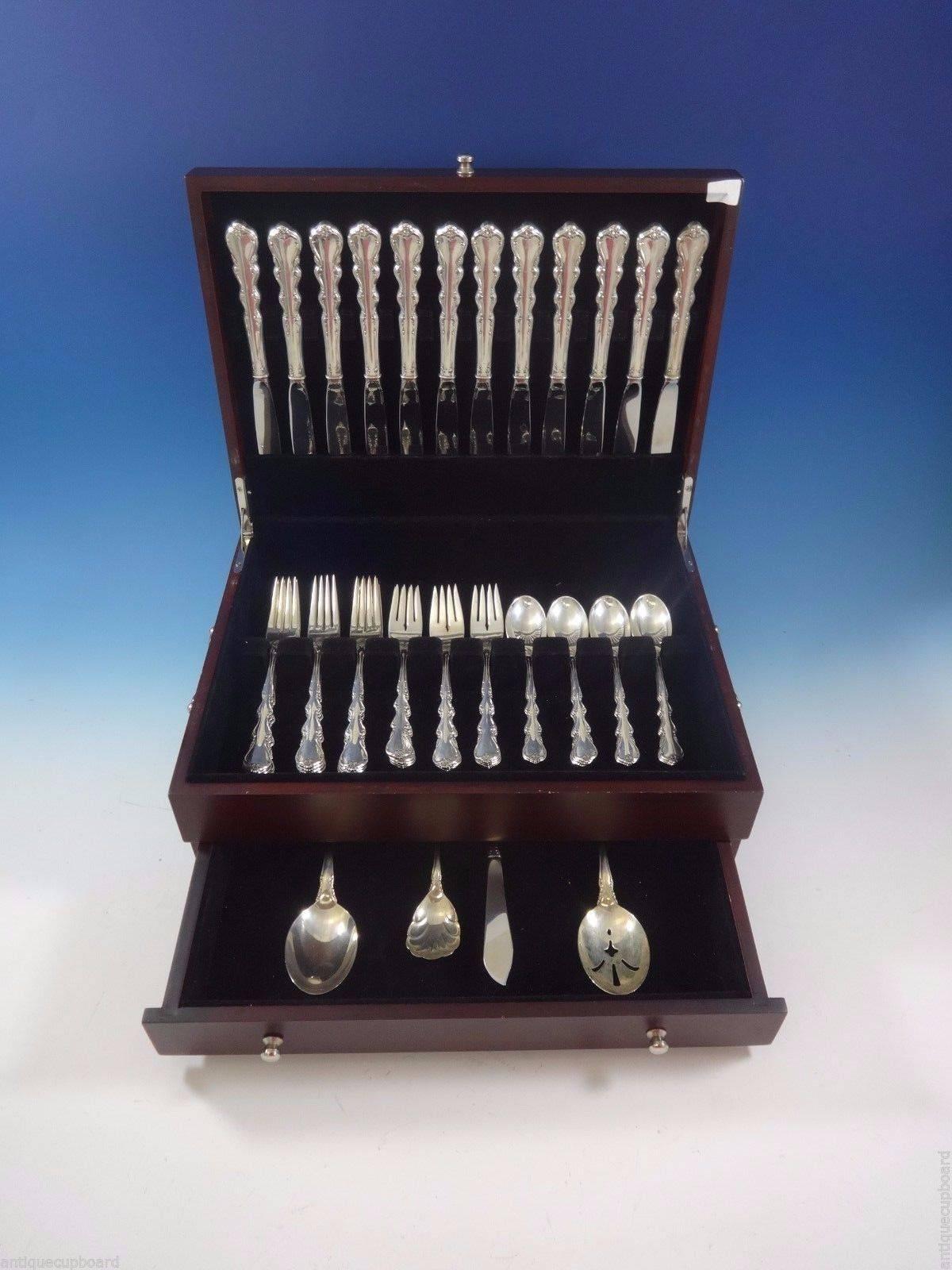 ANGELIQUE BY INTERNATIONAL sterling silver Flatware set - 52 Pieces. This set includes: 

12 KNIVES, 9 1/4