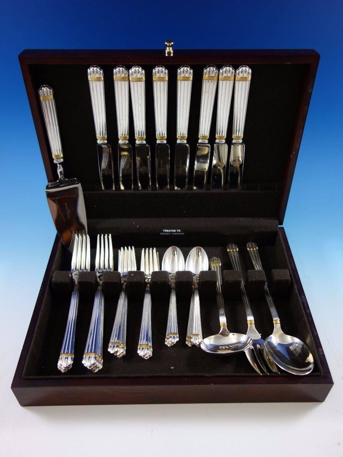Aria Gold accent by Christofle France sterling silver dinner flatware set, 36 pieces. This set includes: eight dinner knives, 9 3/4