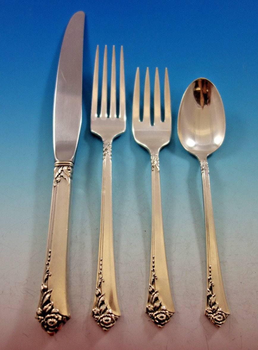 Damask rose by Oneida sterling silver flatware set, 32 pieces. This set includes: 

Eight knives, 8 3/4
