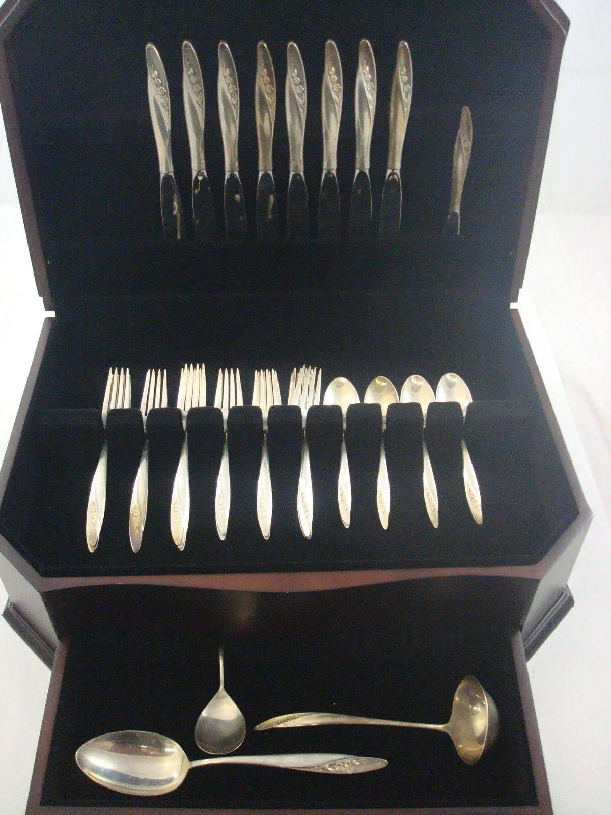 Blithe spirit by Gorham sterling silver flatware set, 36 pieces. This set includes: 

eight knives, 9 1/4
