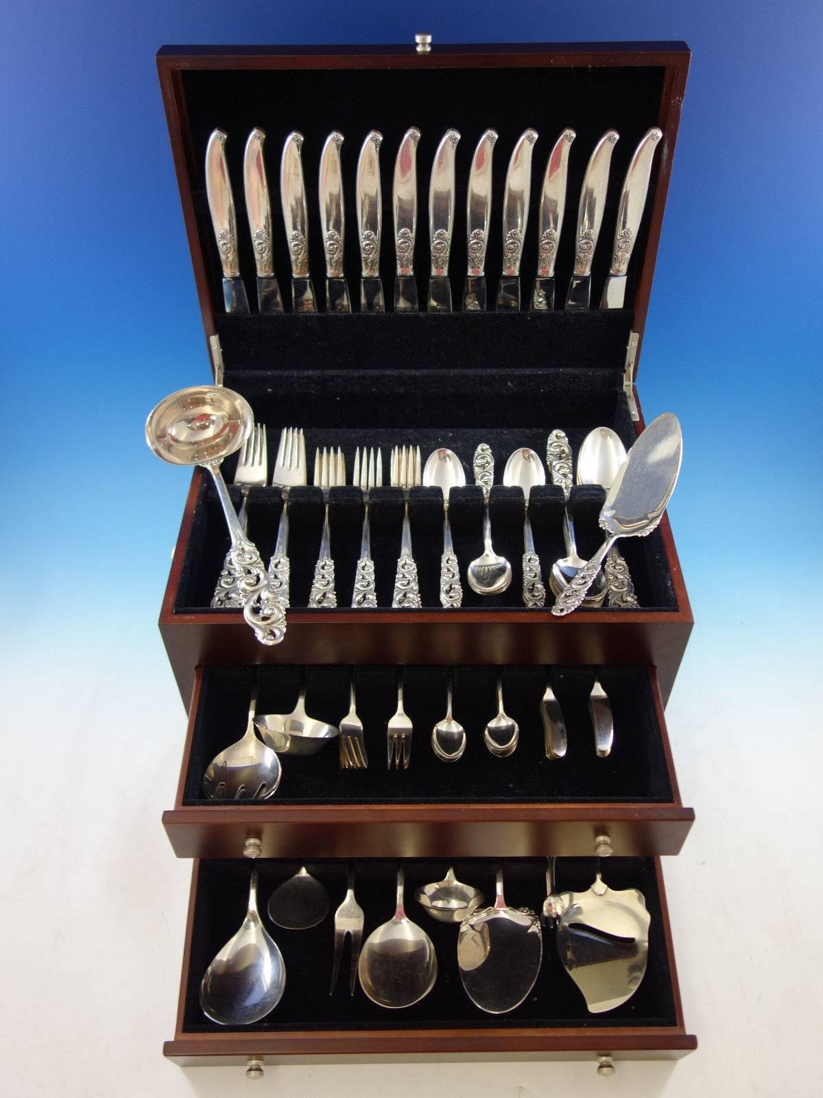 Tele by Mylius Brodrene 830 silver Norwegian flatware set, 110 pieces. This set features pierced handles and includes: 

12 dinner knives, 8 3/4