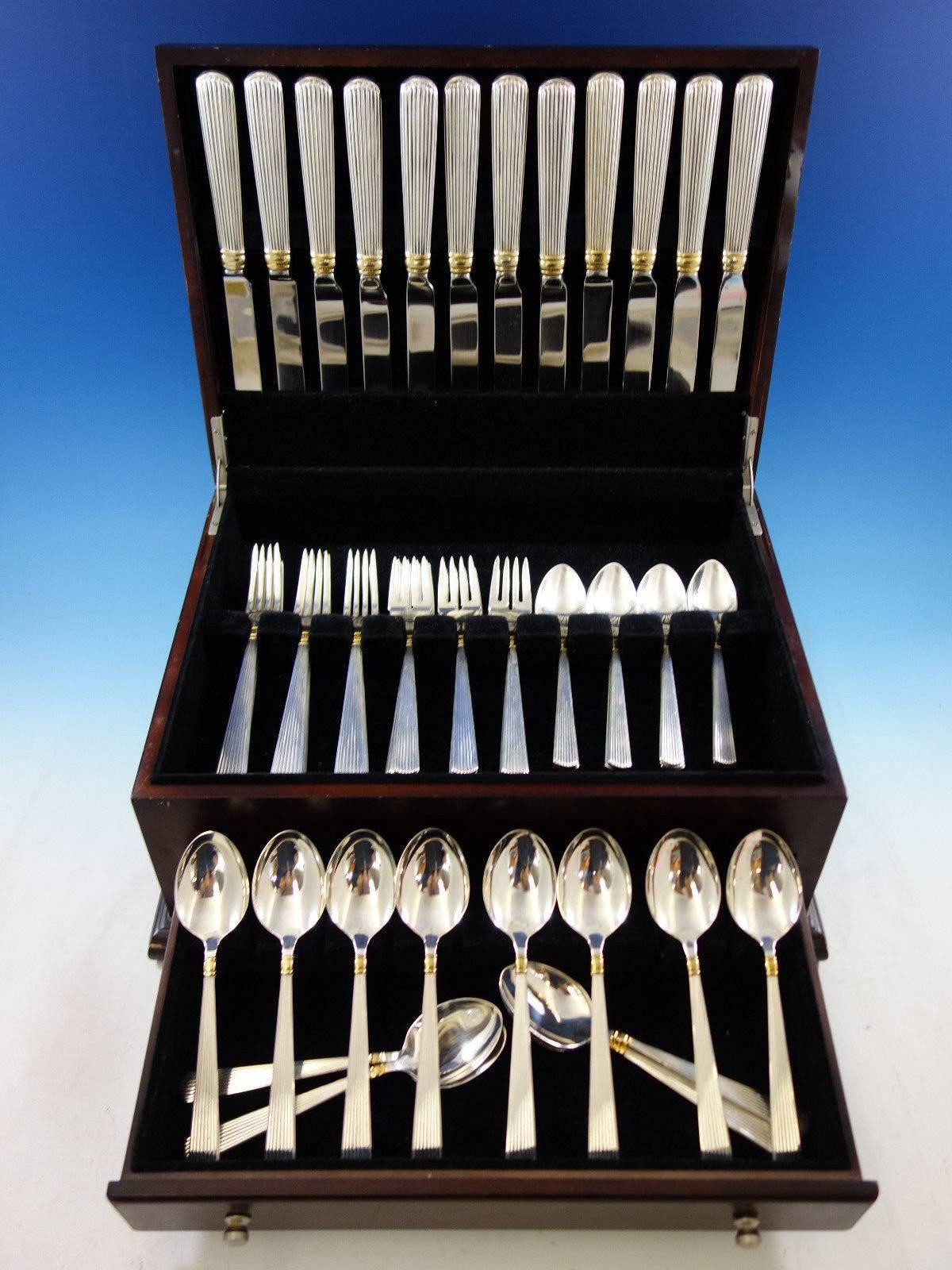 Ashmont Gold by Reed & Barton sterling silver flatware set of 60 pieces. This set includes: 

12 dinner size knives, 9 7/8