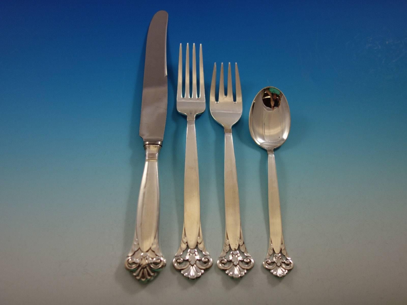 Cloister by Th. Marthinsen Norwegian sterling silver Flatware set with pierced handle, 54 pieces. This set includes:Eight dinner size knives, 9 1/2