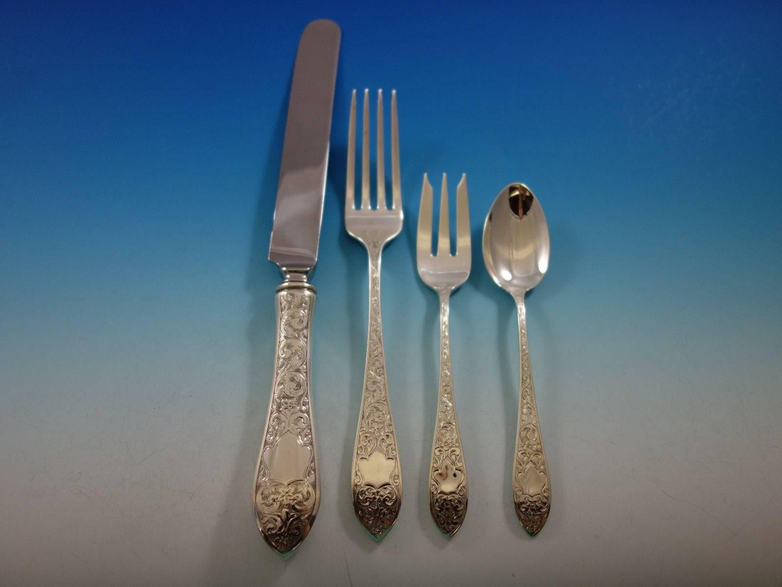 Colonial B engraved by Whiting (circa 1907) sterling silver banquet and luncheon size flatware set, 74 pieces. This set includes: 

six large banquet size knives, 10 1/4