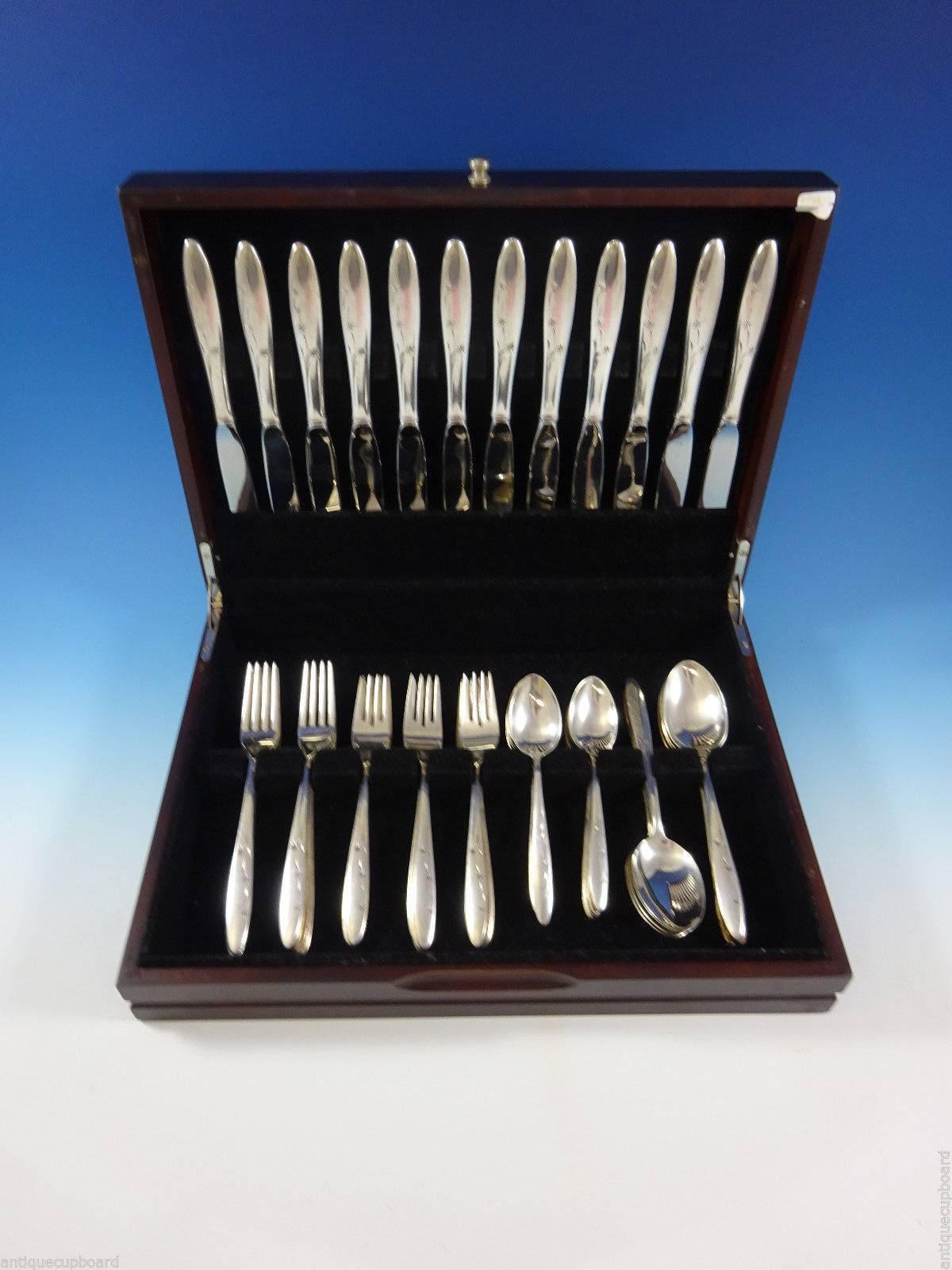 Celeste by Gorham, circa 1956 sterling silver flatware set of 60 pieces. This set includes: 

12 knives, 9 3/8