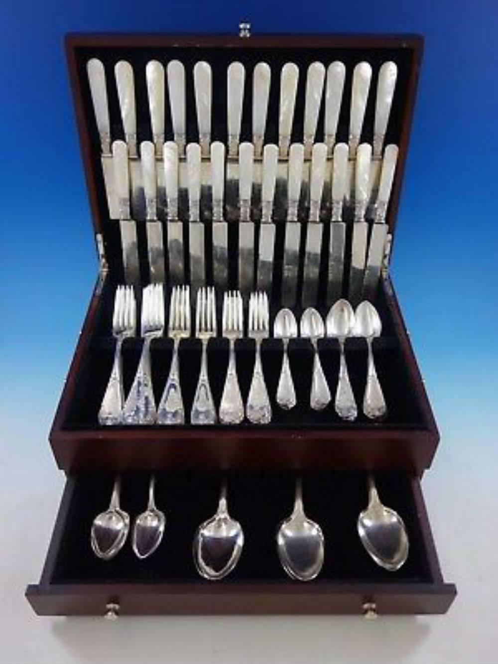 Rare early figural gargoyle by Vanderslice, circa 1868, Sterling silver dinner and luncheon size flatware set with mother-of-pearl knives-124 pieces. Early sets of sterling usually included mother-of-pearl knives-hollow handle knives were invented