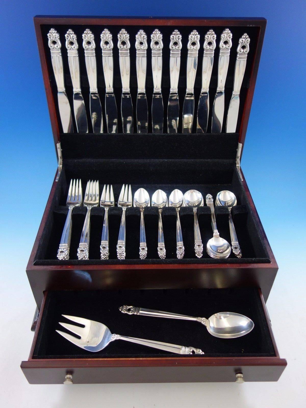 Royal Danish by International dinner size sterling silver flatware set, 62 pieces. This set includes: 

12 dinner knives, 9 3/4