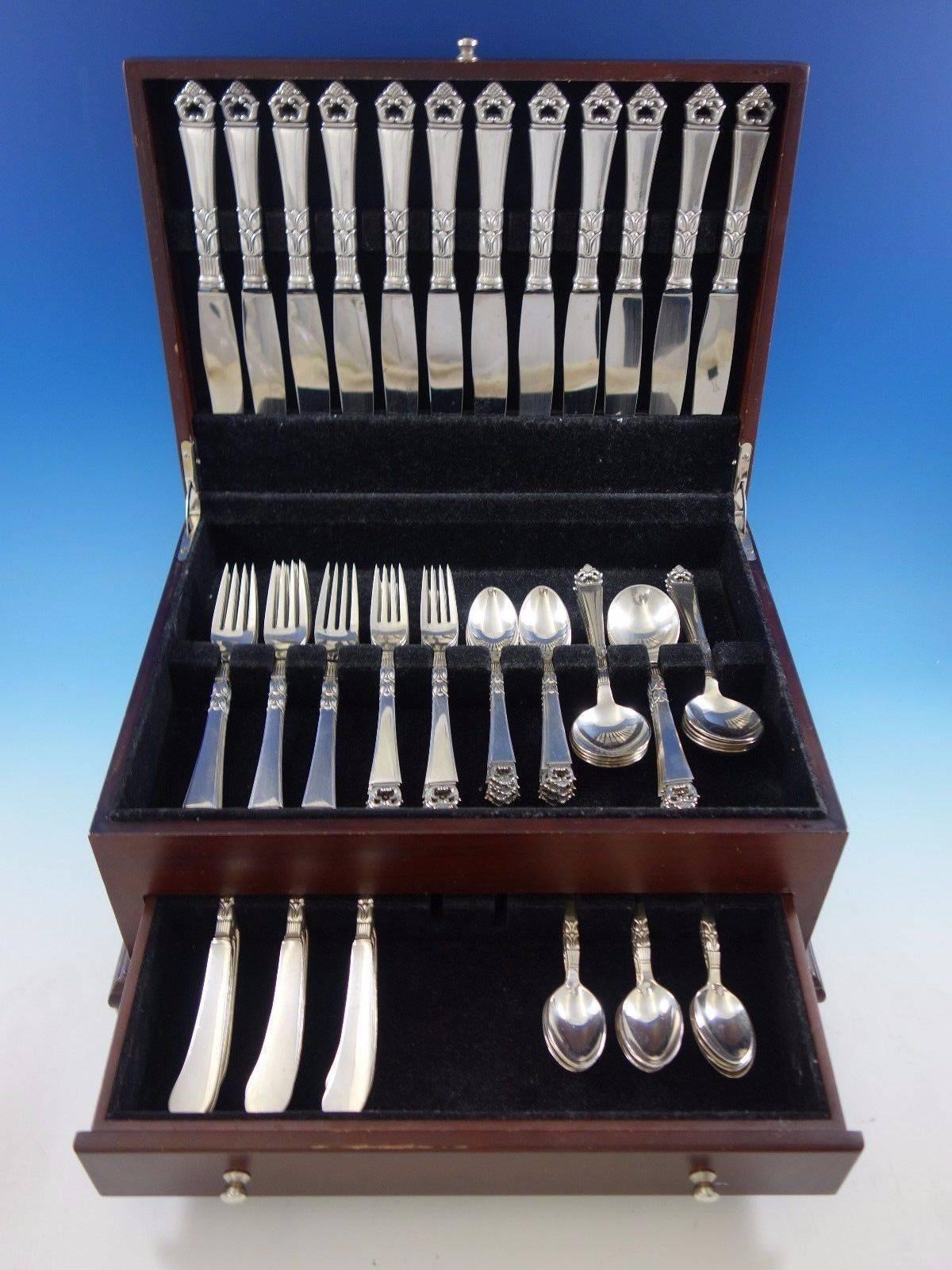 Danish Crown by Frigast sterling silver flatware set, 84 pieces. This set includes: 

12 dinner knives, 10 1/4