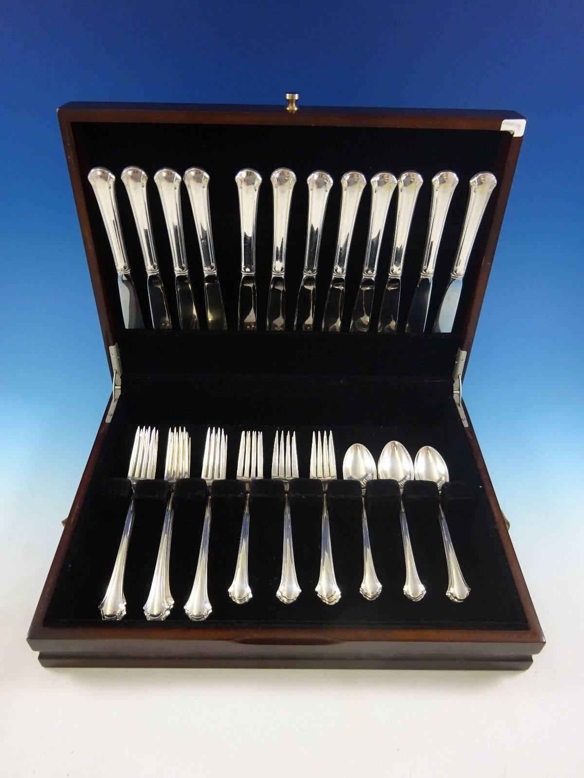 Chippendale by Towle sterling silver flatware set, 48 pieces. This set includes: 

12 knives, 8 3/4