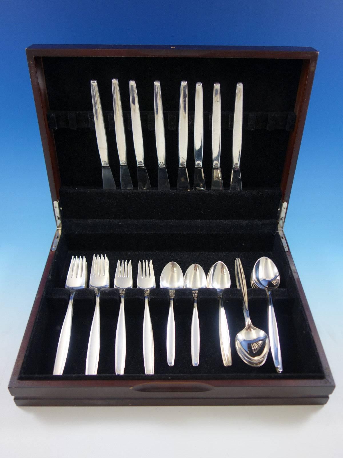 Dinner size Cypress by Georg Jensen Mid-Century Modern sterling silver flatware set - 40 pieces. This set includes: 

Eight dinner knives, 8 3/4