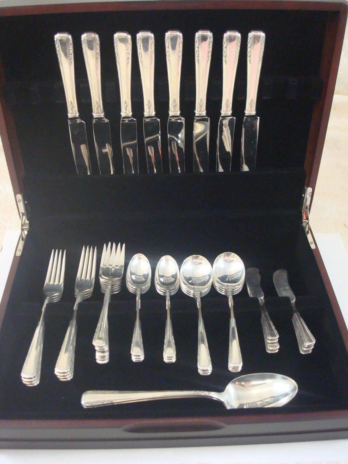 Courtship by International sterling silver flatware set-50 pieces. This set includes: 

Eight knives, 9 1/8