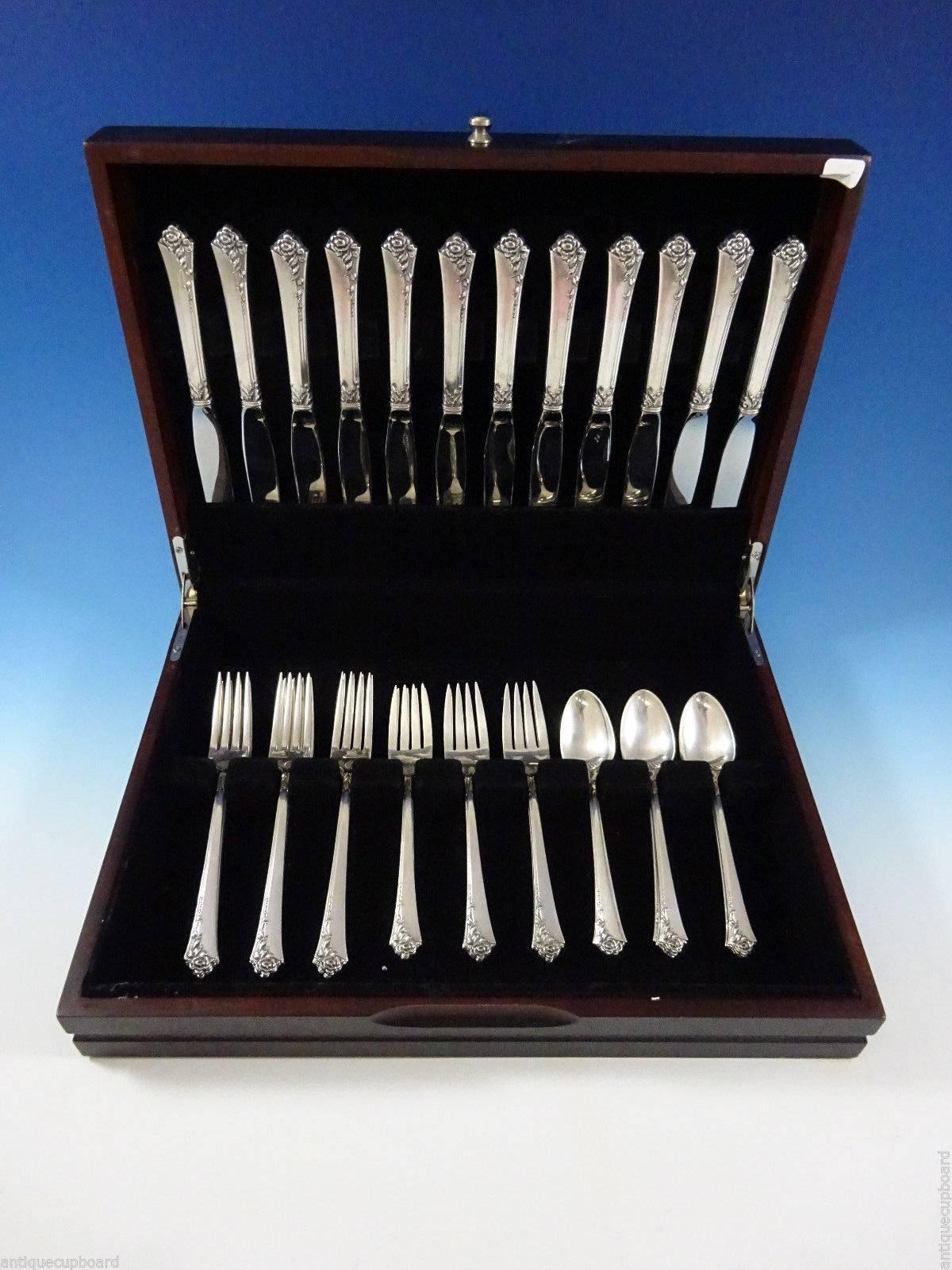 Damask Rose by Oneida sterling silver flatware set of 48 pieces. This set includes: 12 knives 9