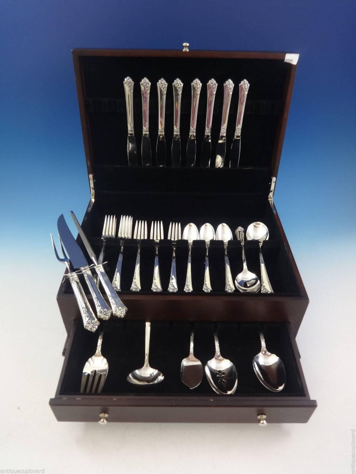 Damask Rose by Oneida sterling silver flatware set, 48 piece set. This set includes:

Eight knives, 8 3/4