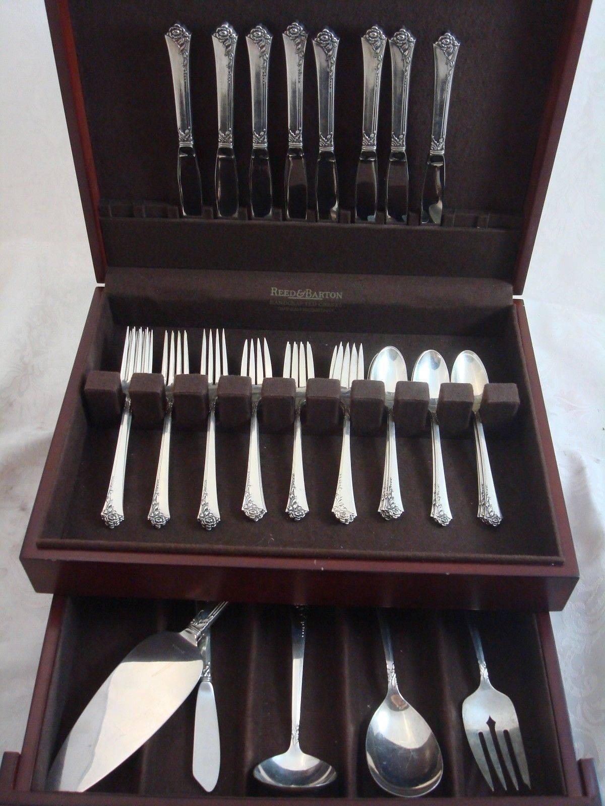 Damask Rose by Oneida sterling silver flatware set, 37 piece set. This set includes: 

eight knives, 8 7/8