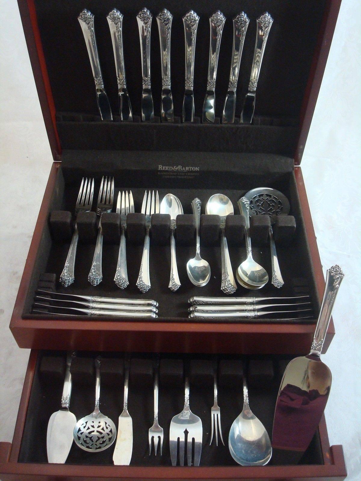 Damask Rose by Oneida sterling silver place size flatware set, 57 piece set. This set includes: 

Eight place size knives, 9 1/8