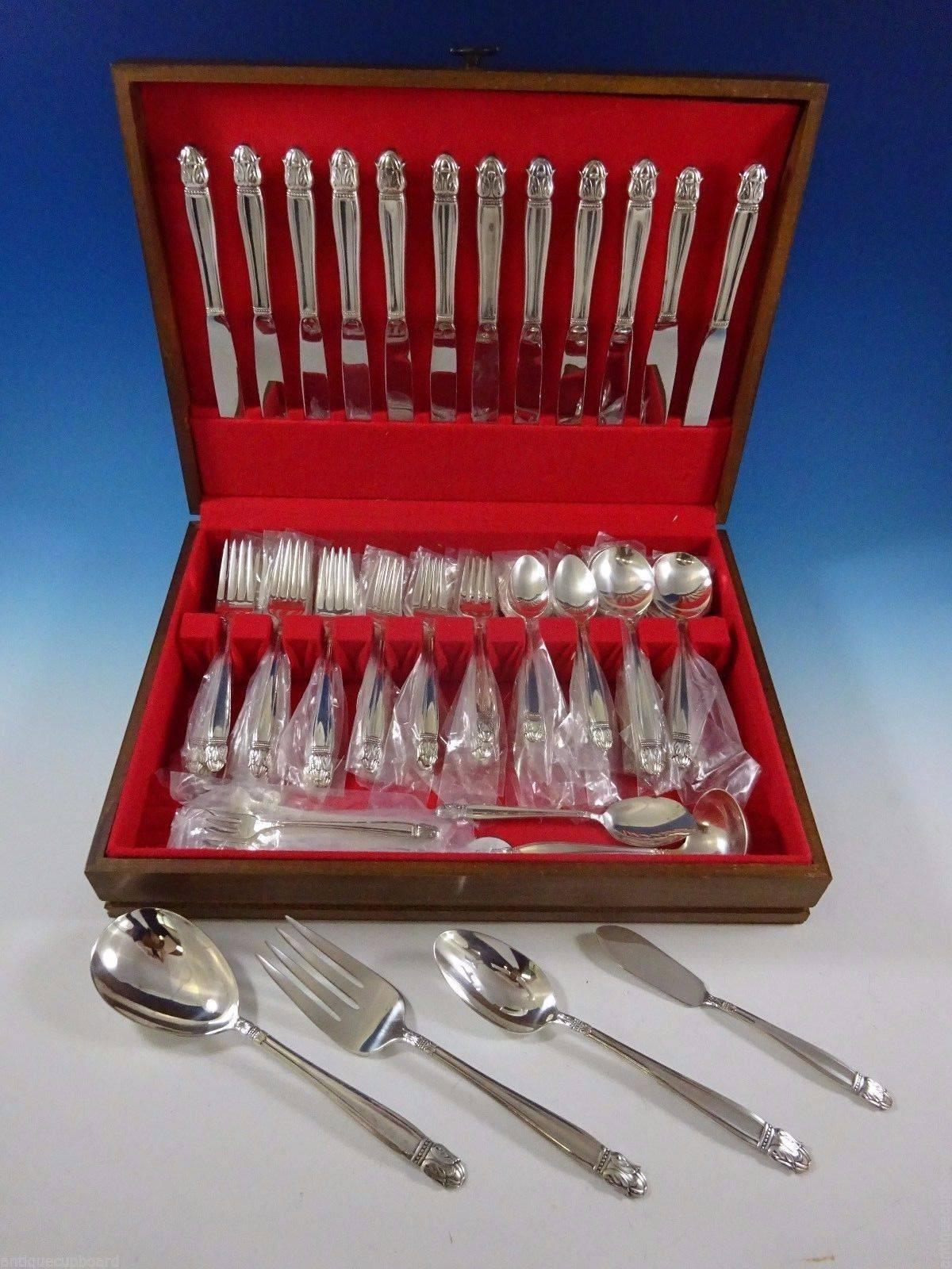 Danish Princess by Holmes & Edwards silver plate flatware set of 78 pieces. This set includes: 12 dinner knives, 9", 12 dinner forks, 7 1/2", 12 salad forks, 6 3/4", 12 teaspoons, 6 1/8", 12 cream soup spoons, 7", 12