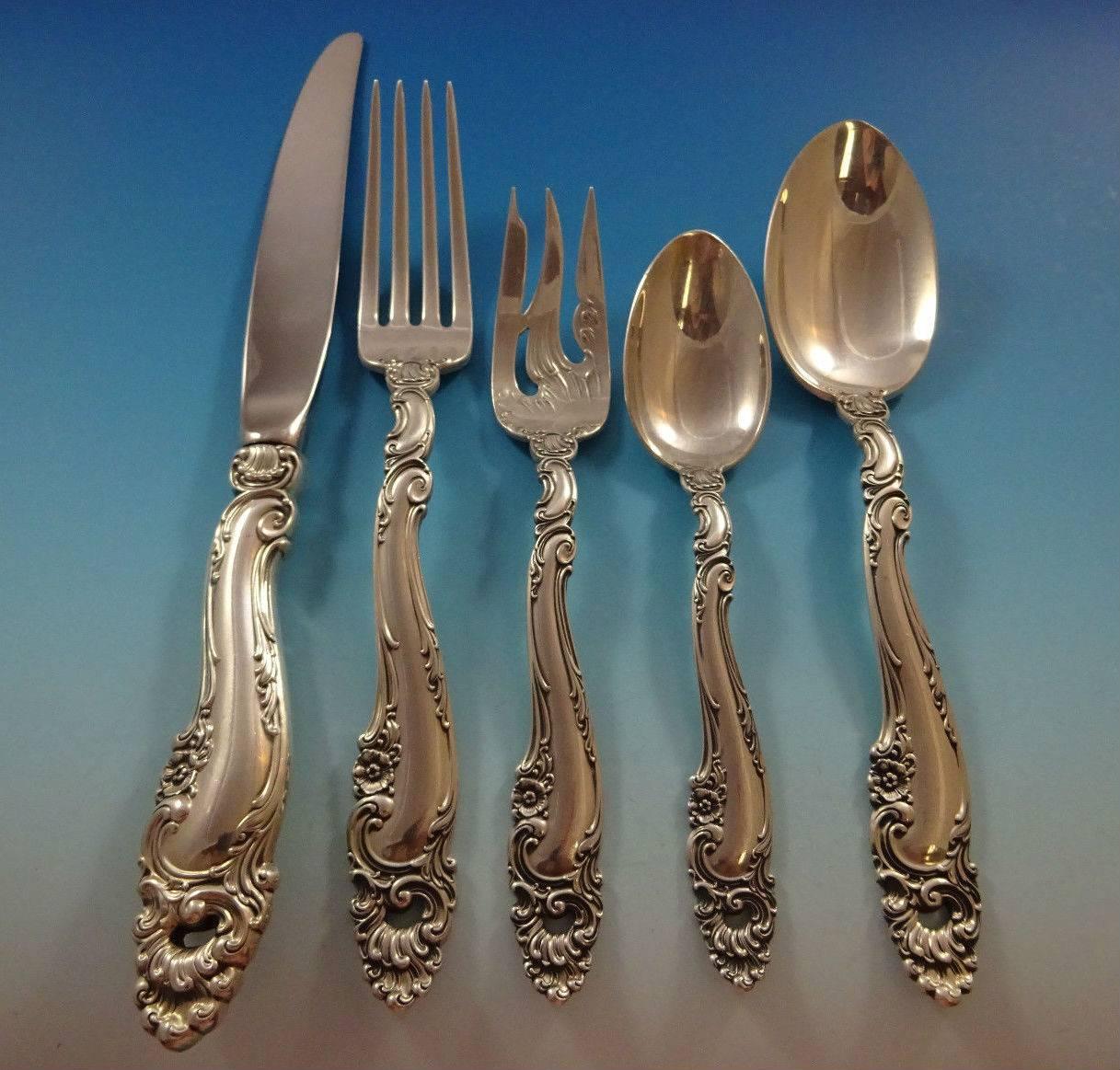 Decor by Gorham sterling silver flatware set - 141 pieces. This pattern is heavy and features rococo swirls, shells and small flowers. This set includes: 

12 dinner knives, 9 5/8