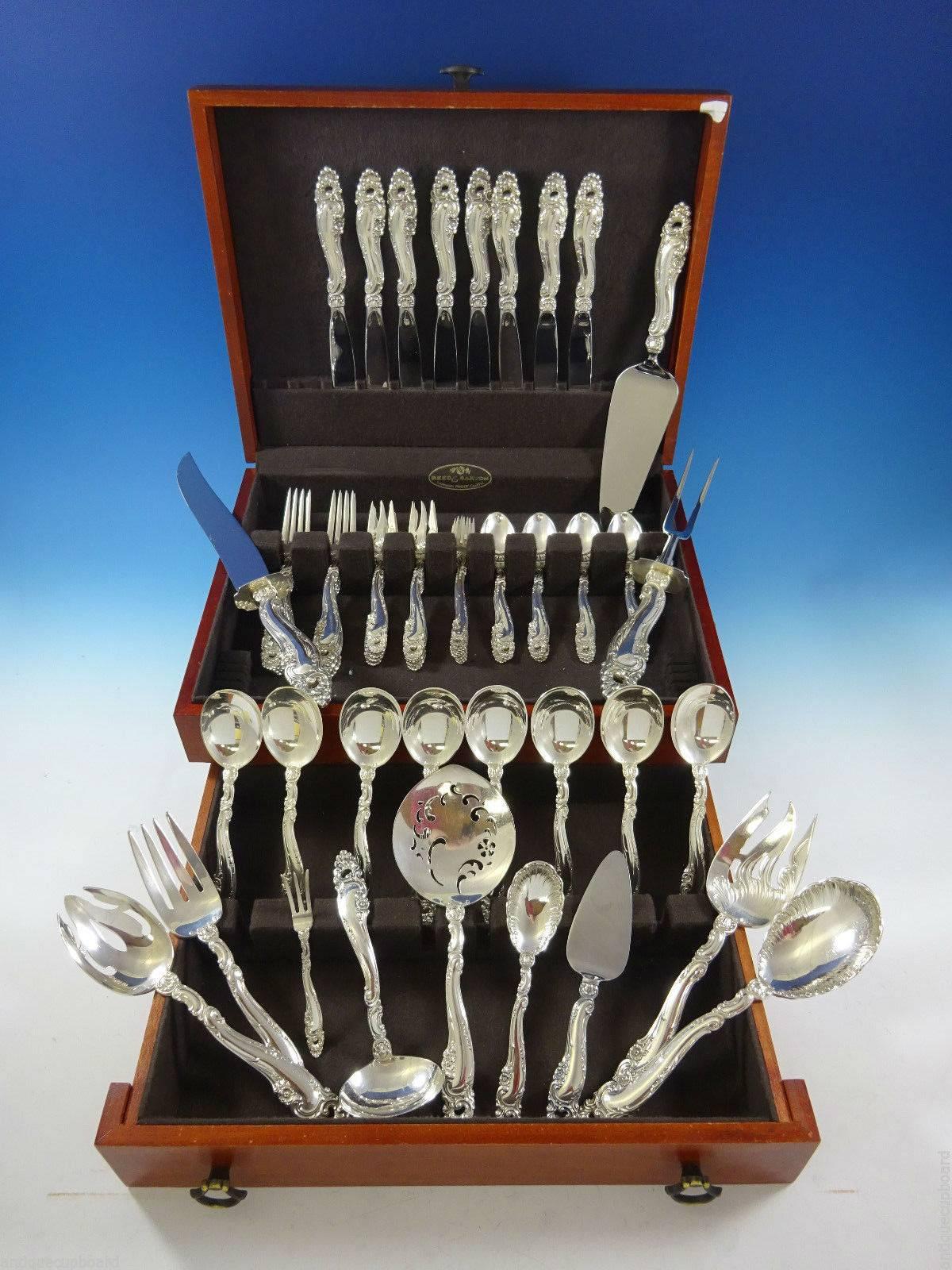 Decor by Gorham sterling silver flatware set, 60 pieces. This pattern is heavy and features Rococo swirls, shells and small flowers. This set includes: 

Eight knives, 9